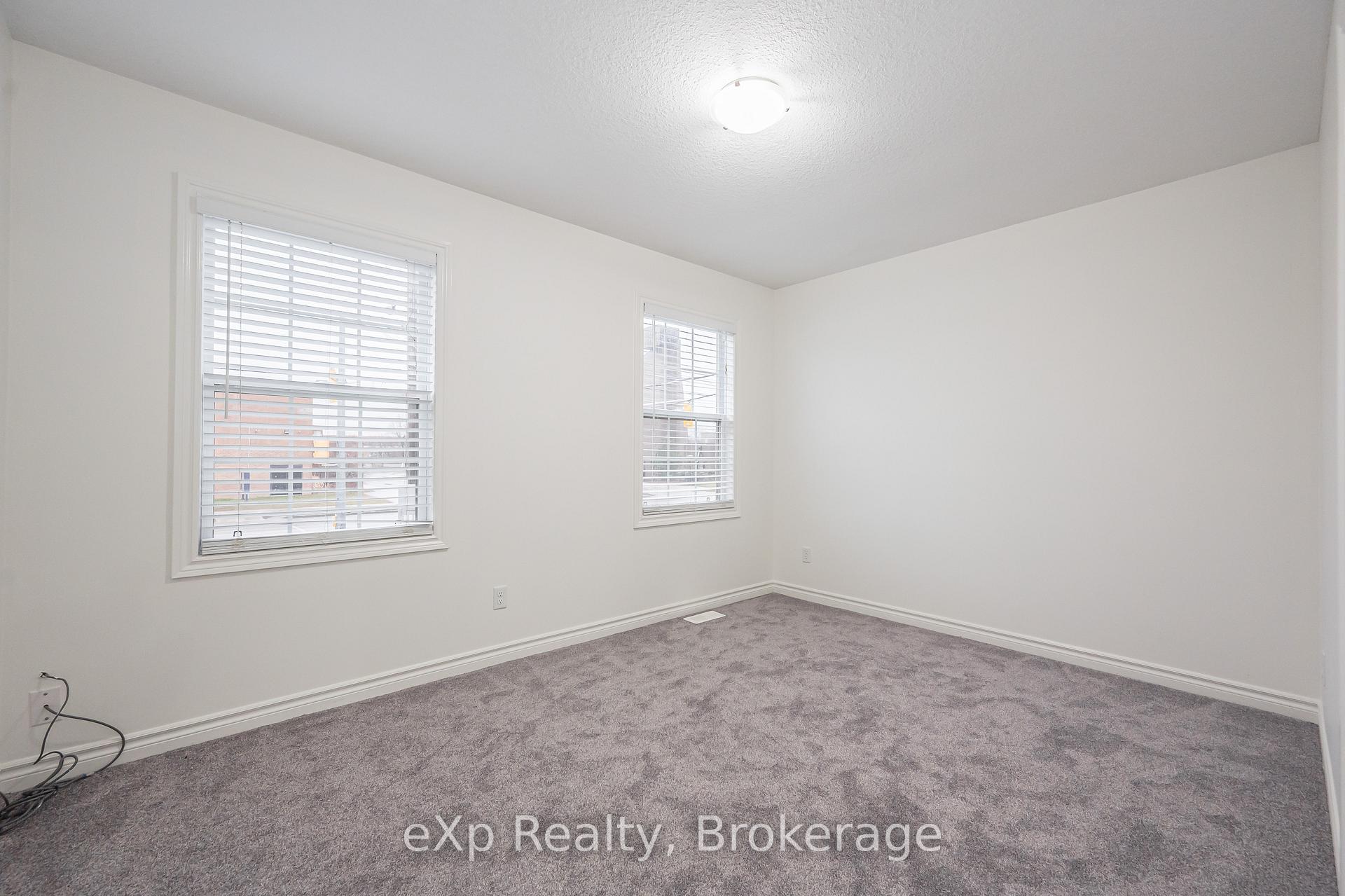 Photo 19 of Unit UPPER, 62 Victoria Road N, Guelph, St. George's — HOMEH