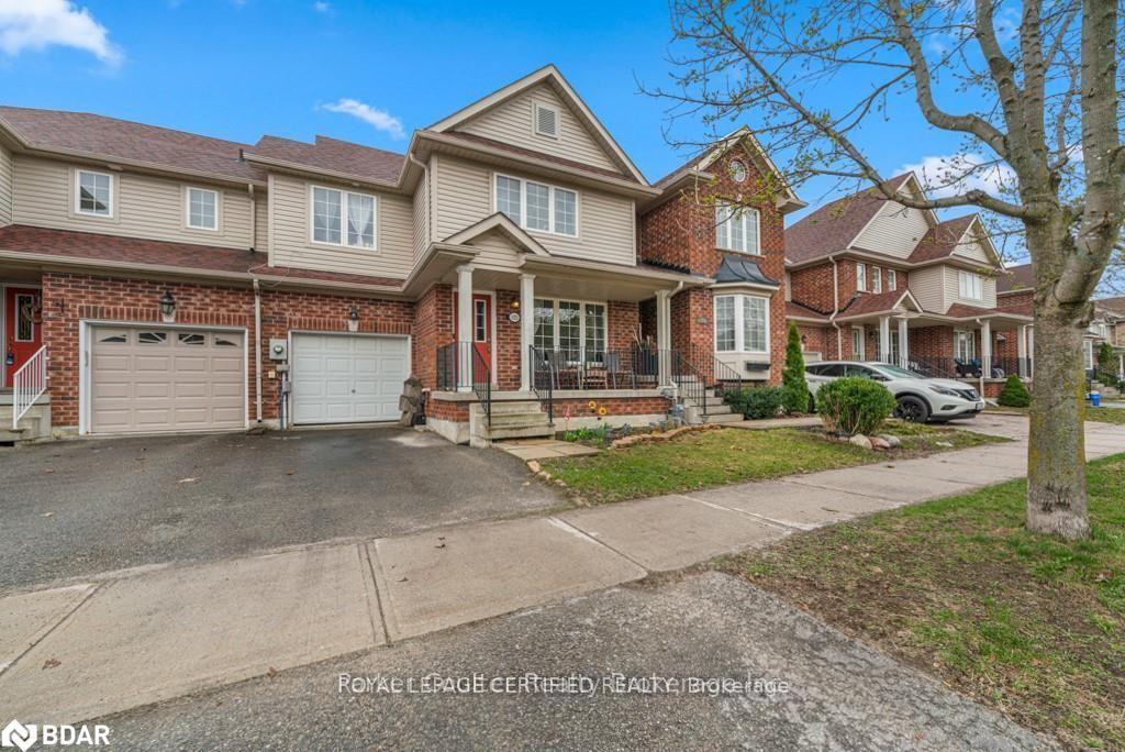 Photo 3 of 133 Thrushwood Drive, Barrie, 400 West — HOMEH