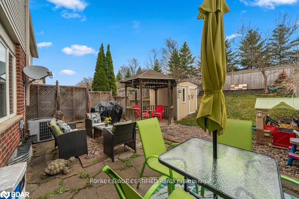 Photo 5 of 133 Thrushwood Drive, Barrie, 400 West — HOMEH