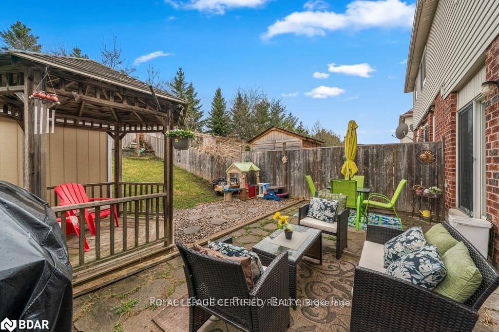 Photo 6 of 133 Thrushwood Drive, Barrie, 400 West — HOMEH