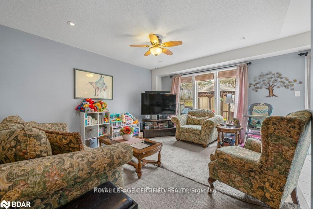 Photo 9 of 133 Thrushwood Drive, Barrie, 400 West — HOMEH