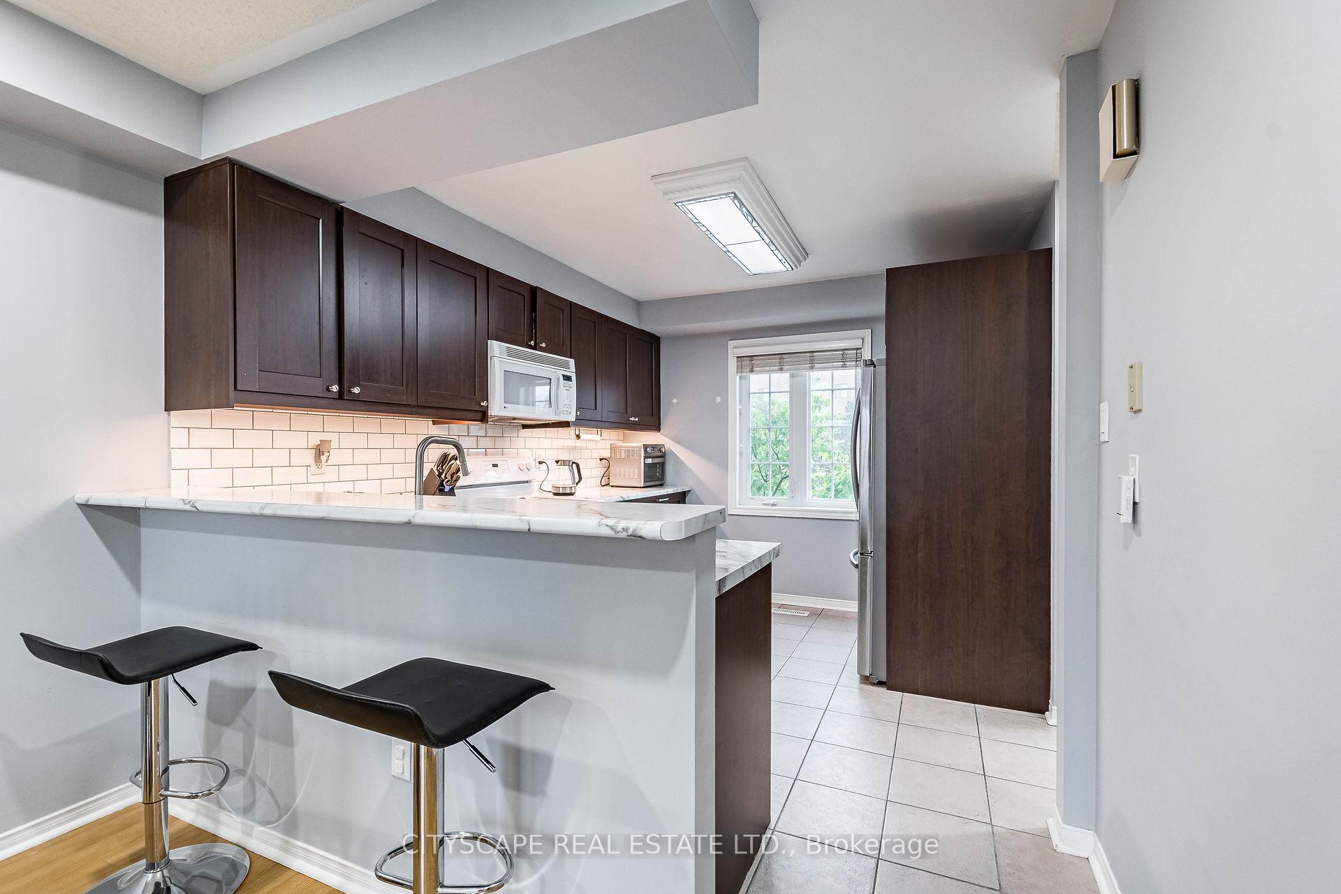 Photo 12 of Unit 39, 6830 Meadowvale Town Centre Circle, Mississauga, Meadowvale — HOMEH
