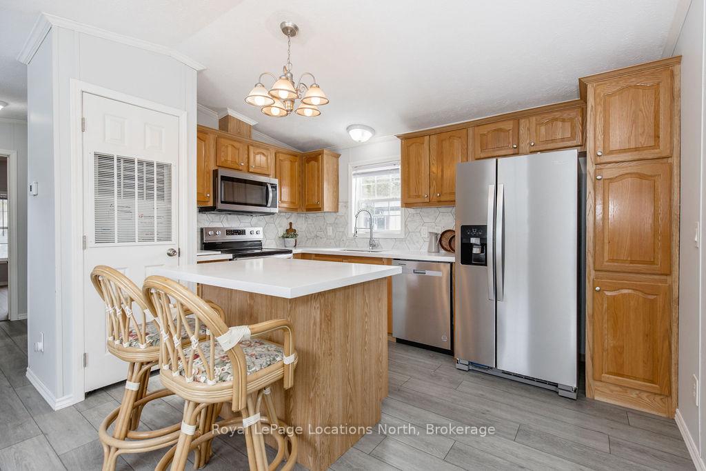 Photo 5 of 89 Georgian Glen Drive, Wasaga Beach — HOMEH
