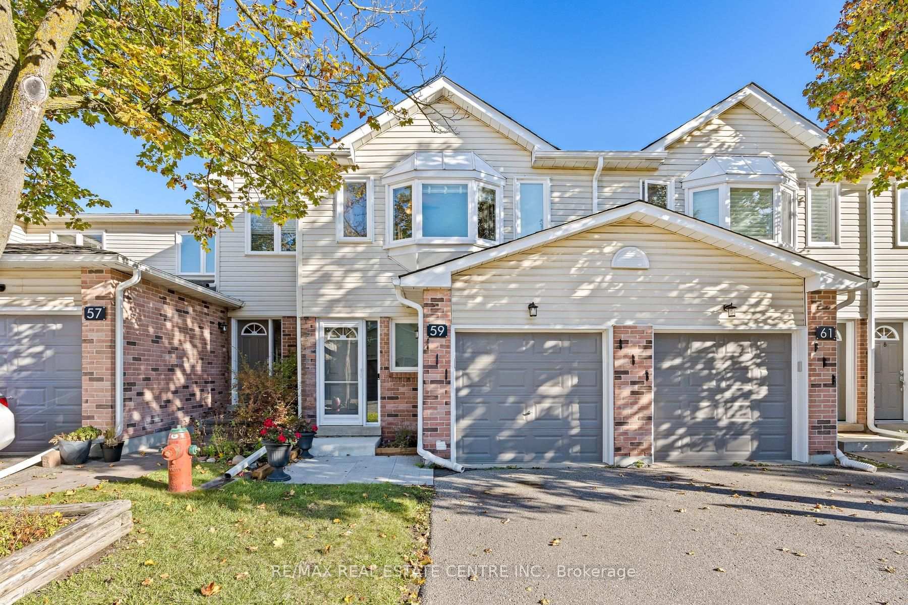 Photo 1 of Unit 97, 59 Corey Circle, Halton Hills, Georgetown — HOMEH
