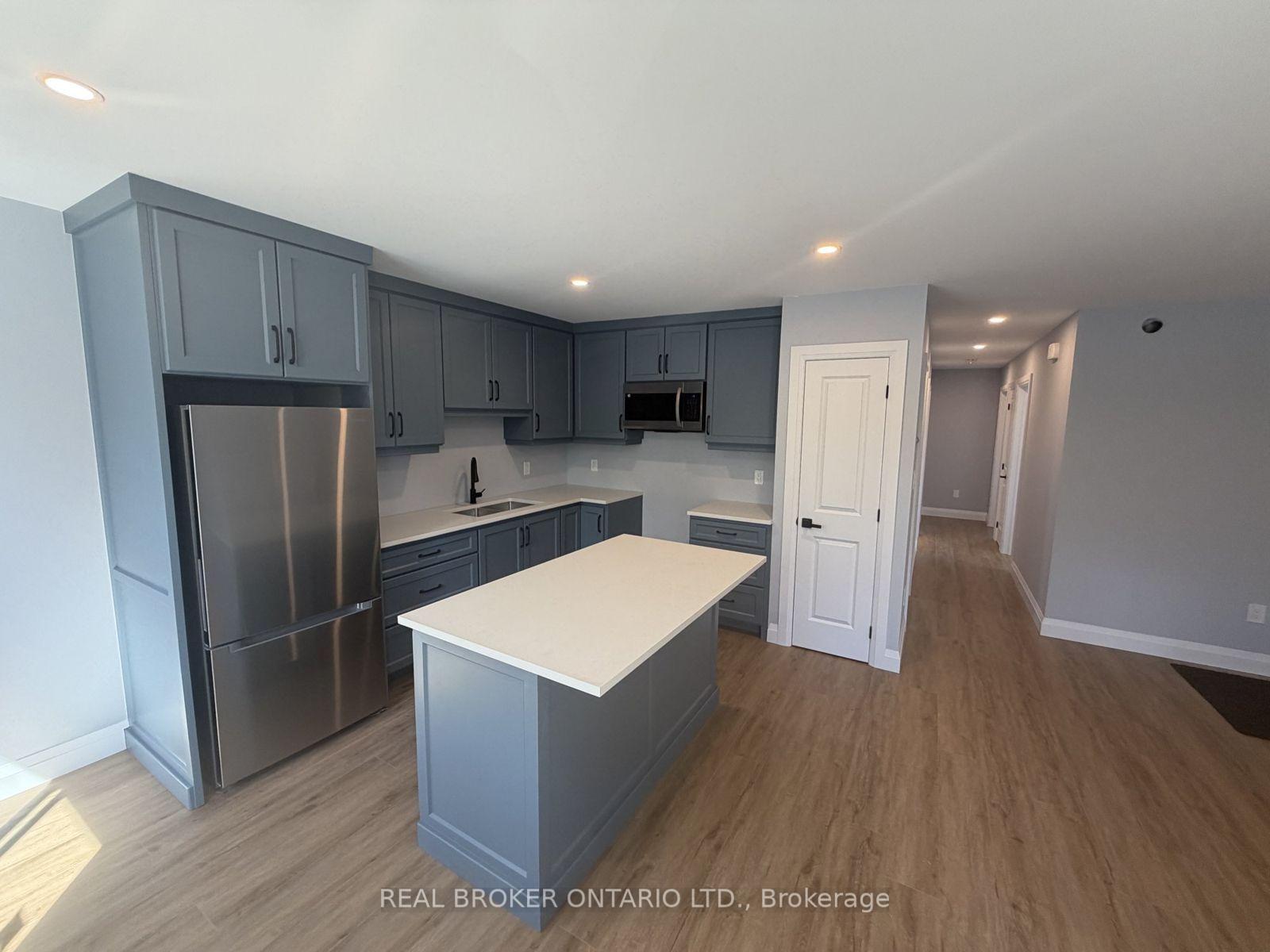Photo 3 of Unit 3, 4385 Huronia Road, Orillia — HOMEH