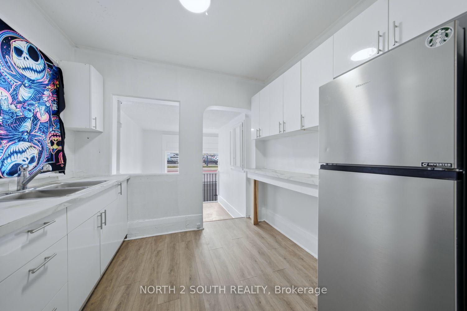 Photo 9 of 880 Dundas Street E, London, East L — HOMEH