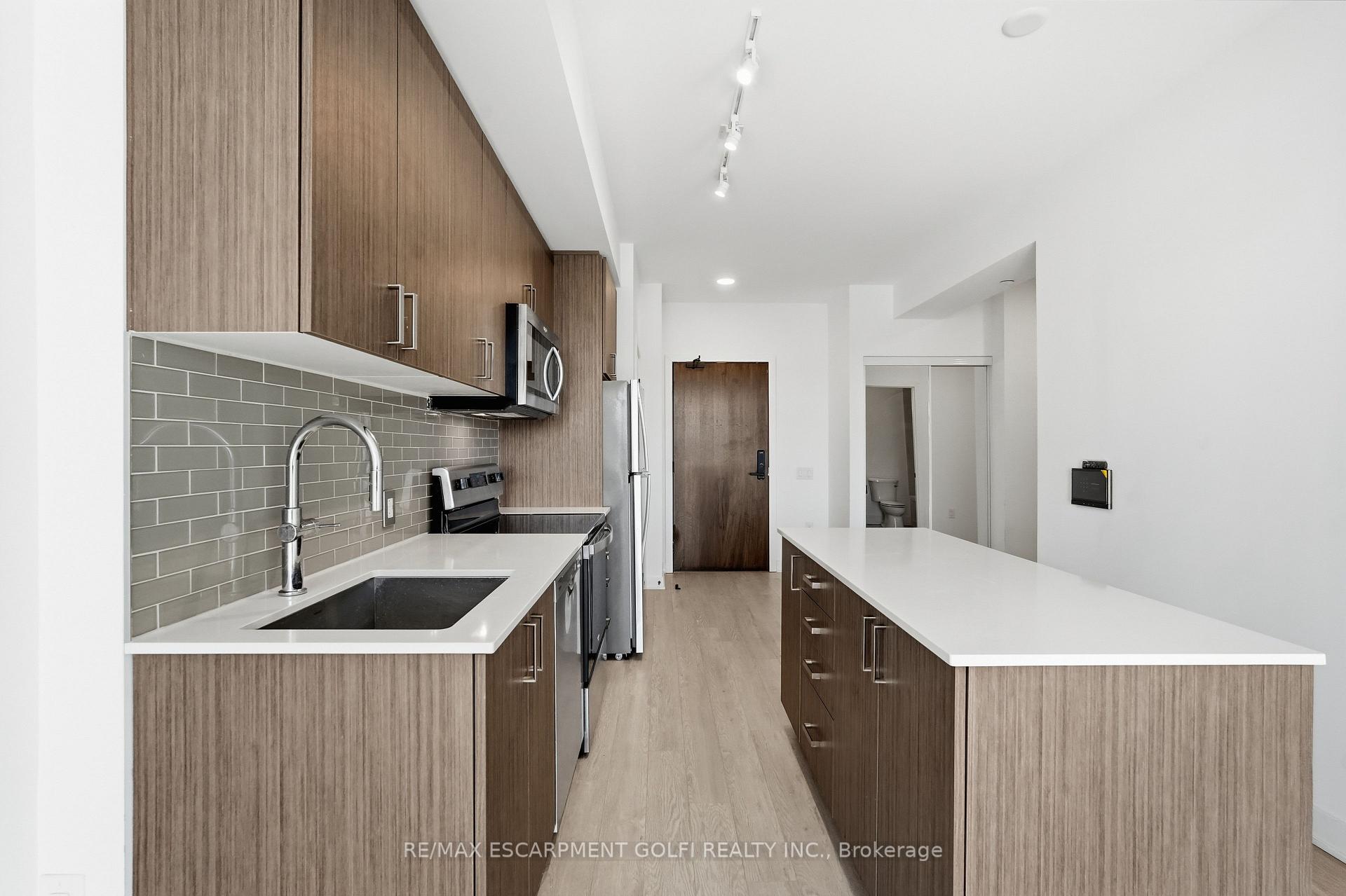 Photo 11 of Unit 302, 2782 Barton Street E, Hamilton, Riverdale — HOMEH