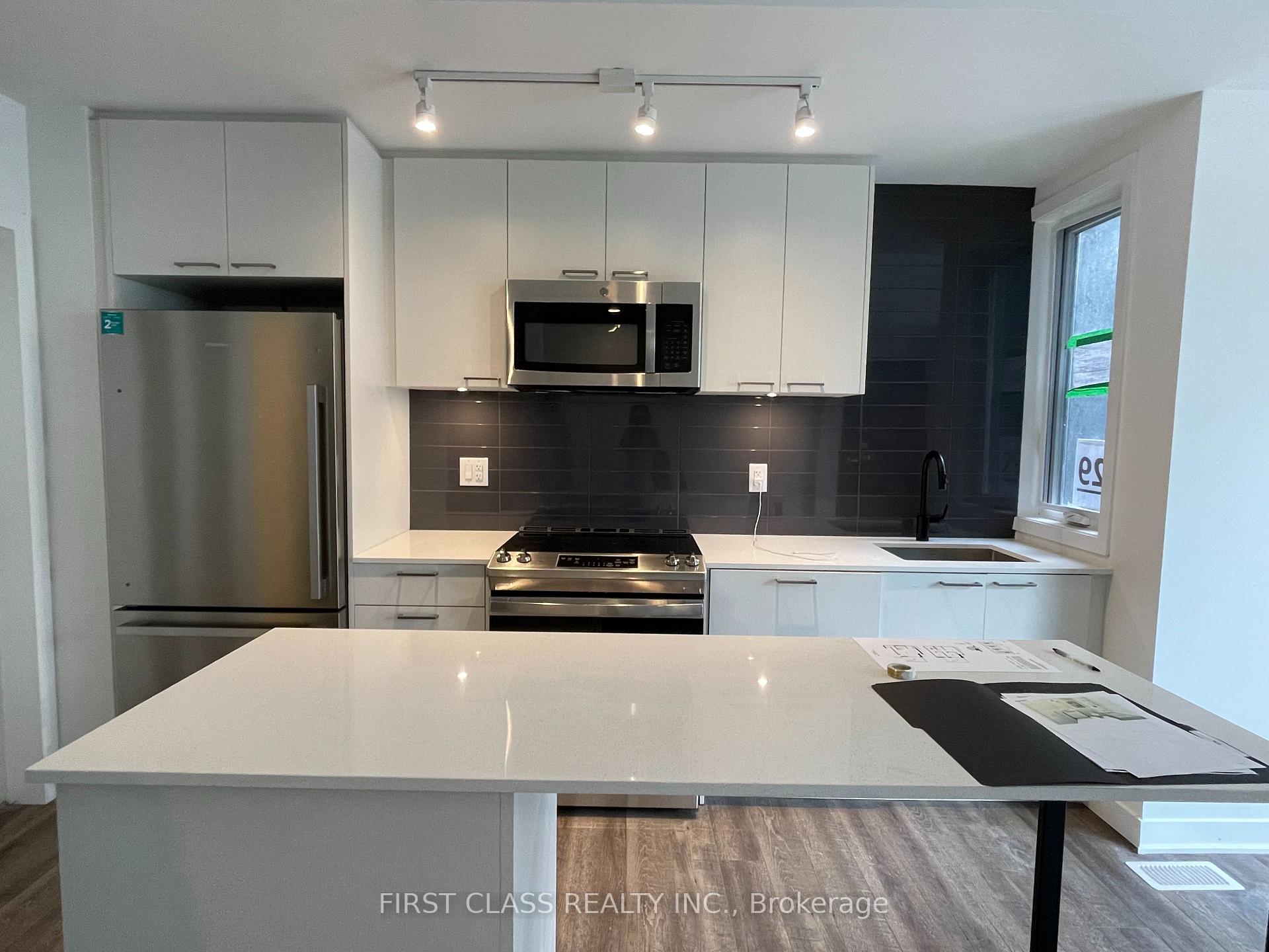 Photo 2 of Unit TH13, 20 Ed Clark Gardens, Toronto, Weston-Pellam Park — HOMEH