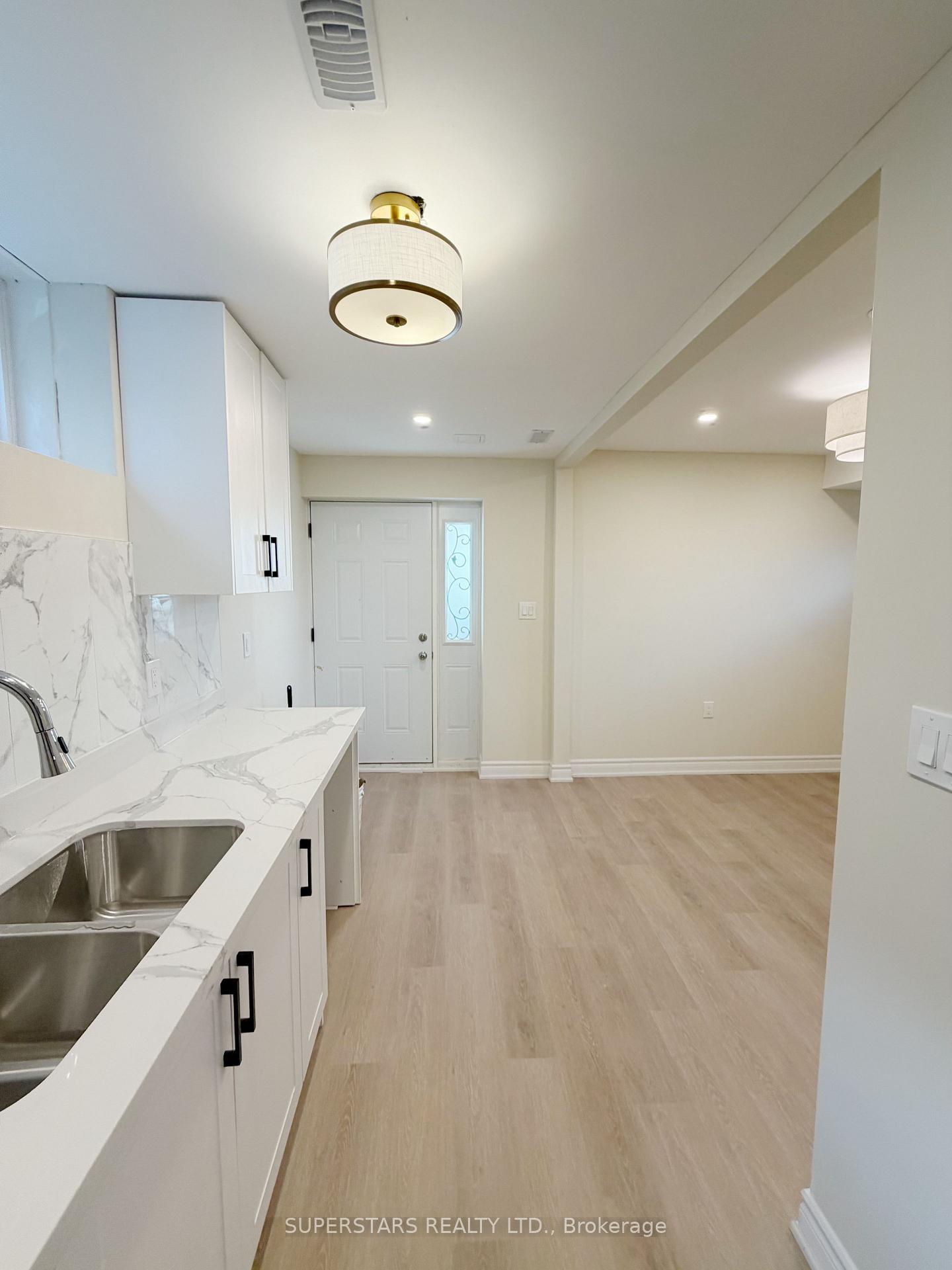 Photo 4 of Unit Bsmt, 243 Goldhawk Trail, Scarborough, Milliken — HOMEH