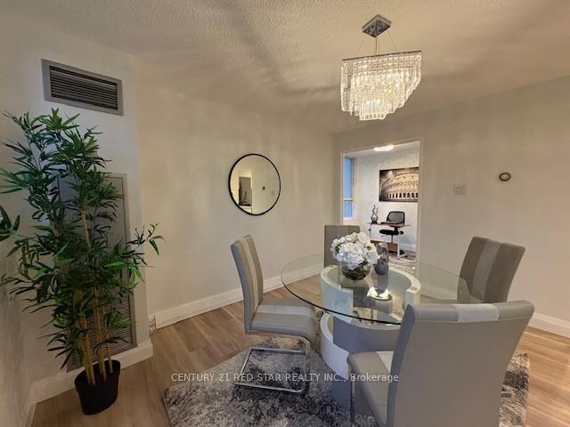 Photo 2 of Unit 107, 3695 Kaneff Crescent, Mississauga, Mississauga Valleys — HOMEH
