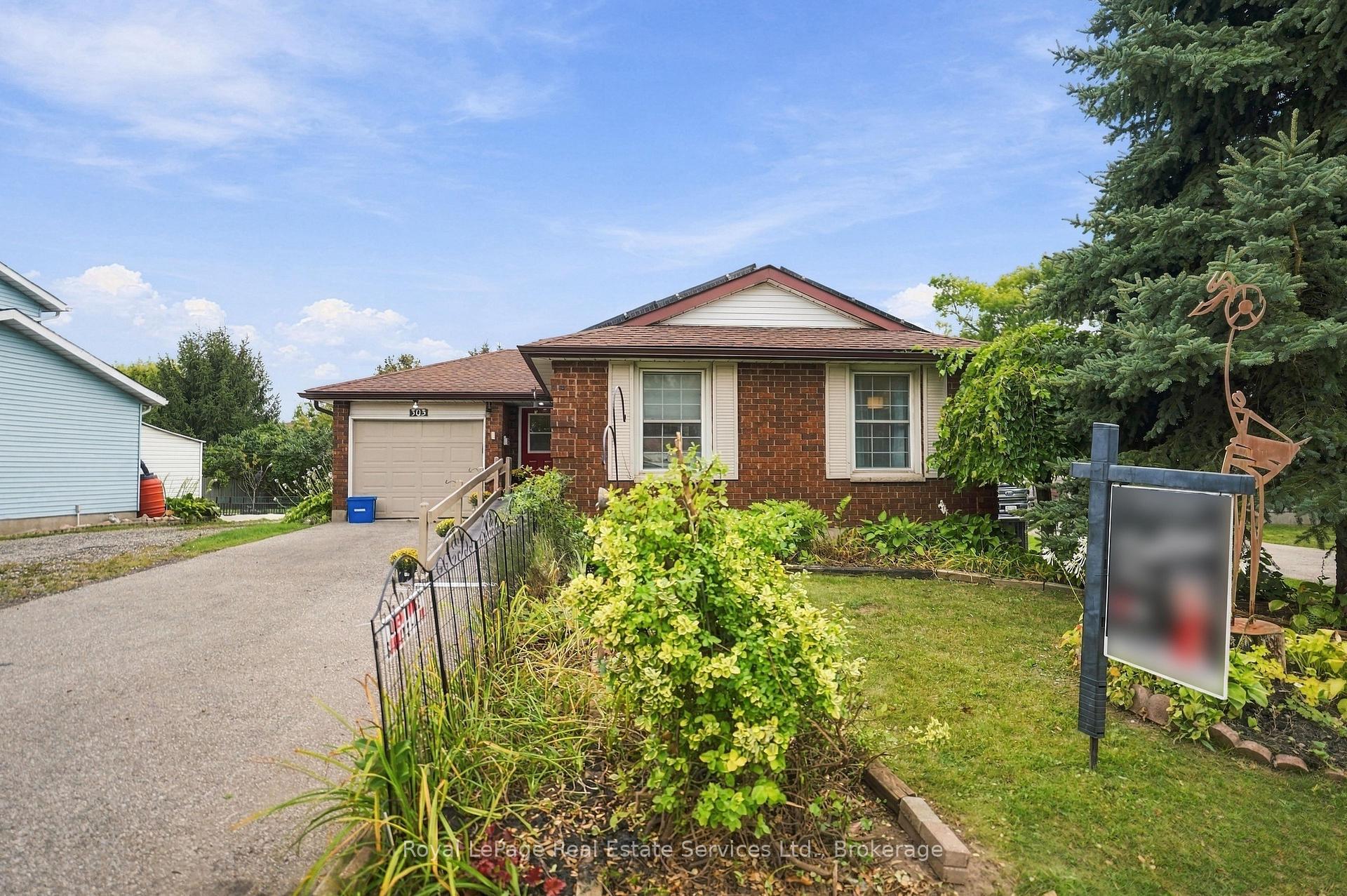 Front of 303 Grand Ridge Drive