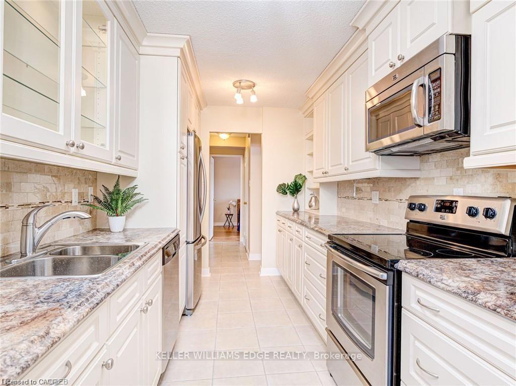 Photo 3 of Unit 302, 2055 Upper Middle Road, Burlington, Brant Hills — HOMEH