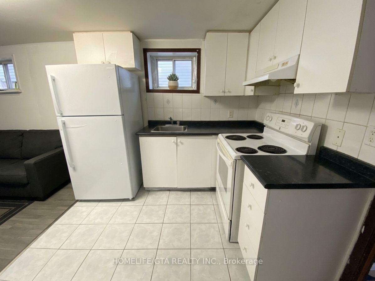 Photo 5 of Unit Basement #1, 126 Painted Post Drive, Scarborough, Woburn — HOMEH