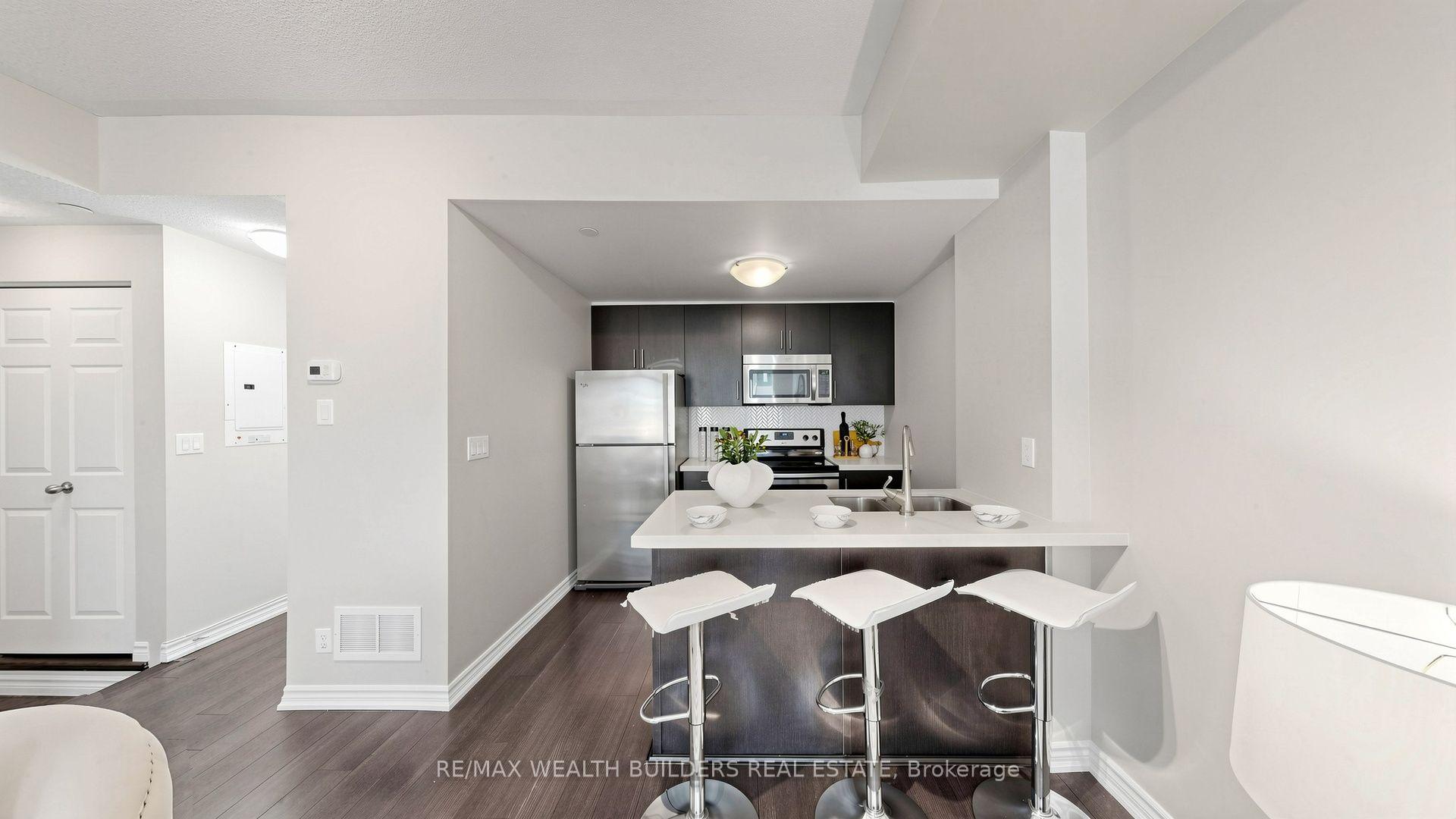 Photo 8 of Unit 115, 40 Carnation Avenue, Etobicoke, Long Branch — HOMEH