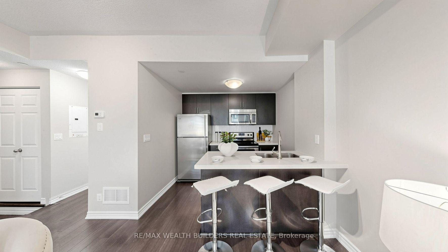 Photo 9 of Unit 115, 40 Carnation Avenue, Etobicoke, Long Branch — HOMEH