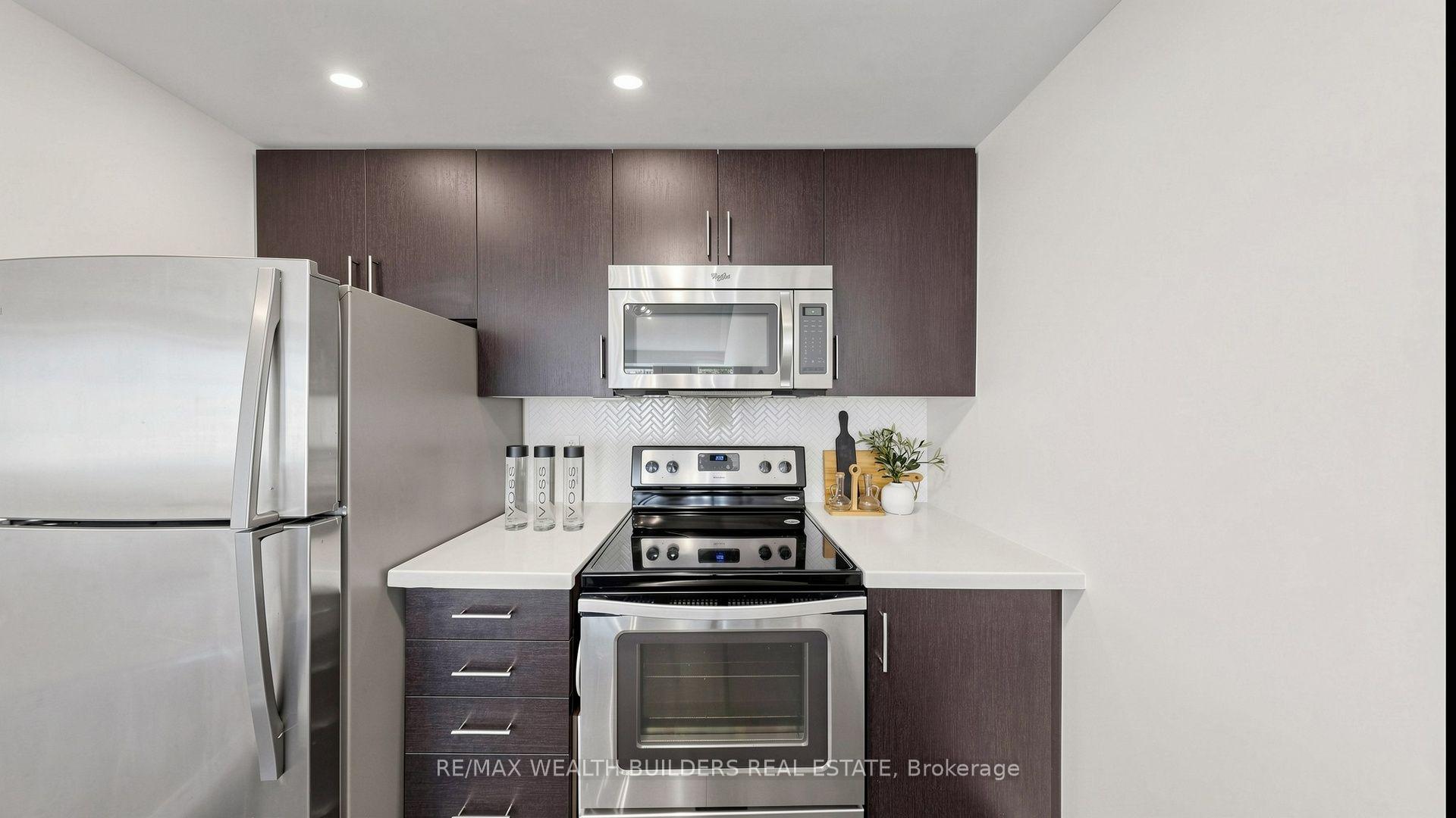 Photo 10 of Unit 115, 40 Carnation Avenue, Etobicoke, Long Branch — HOMEH