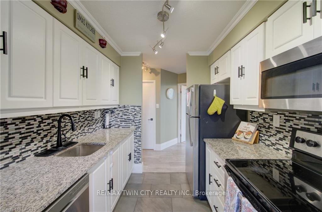 Photo 6 of Unit 409, 3227 King Street E, Kitchener — HOMEH