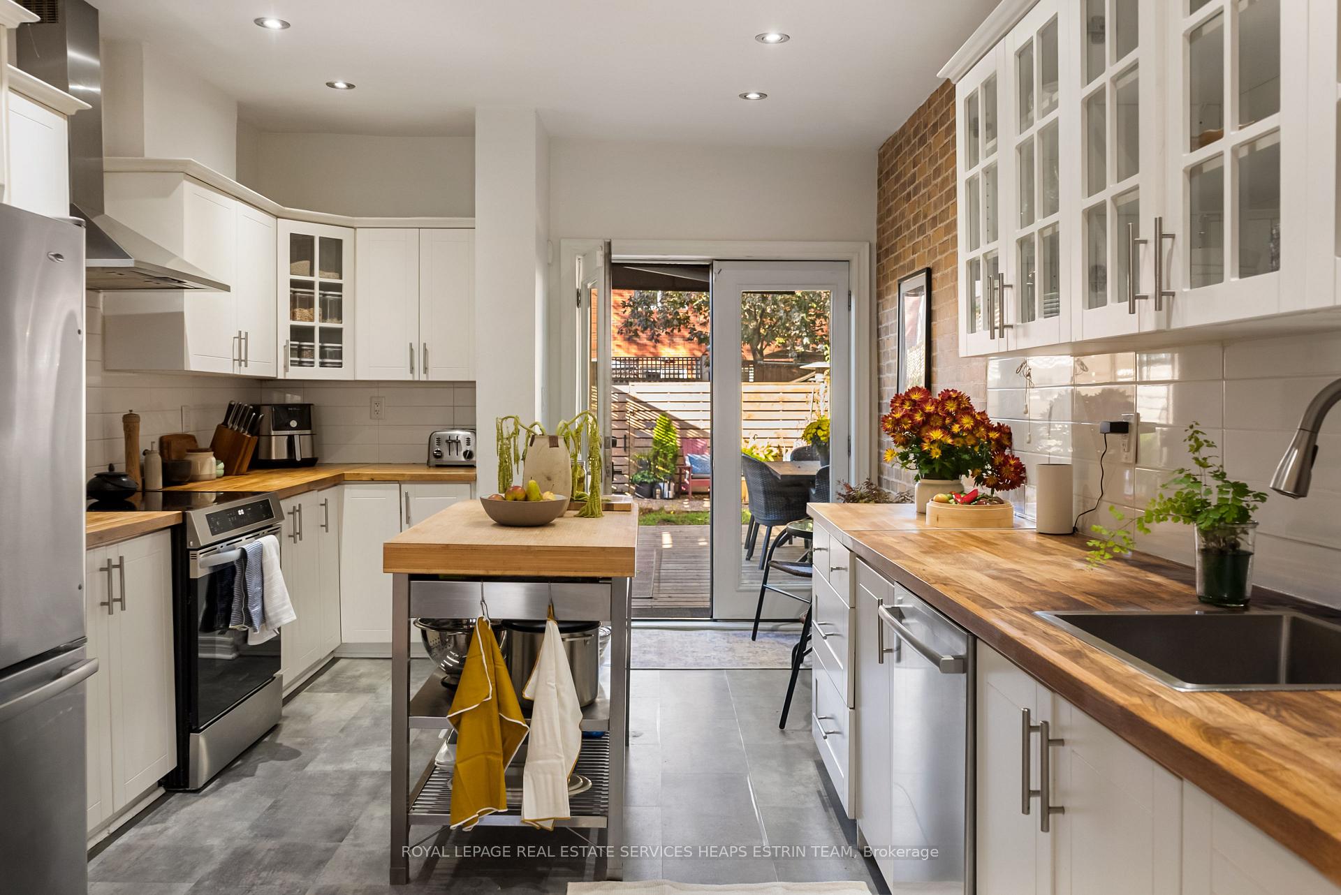 Photo 17 of 14 De Grassi Street, Toronto, South Riverdale — HOMEH