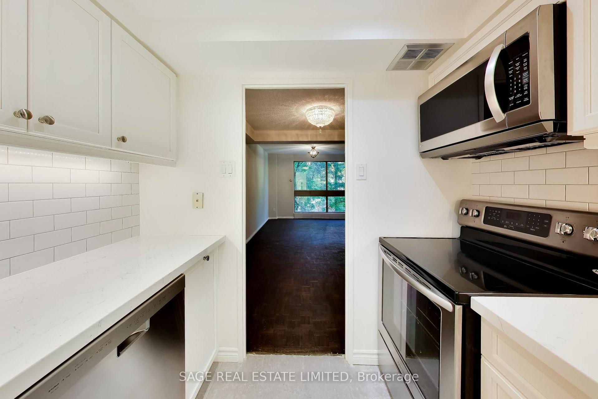 Photo 9 of Unit 404, 63 St Clair Avenue, Toronto, Yonge-St. Clair — HOMEH