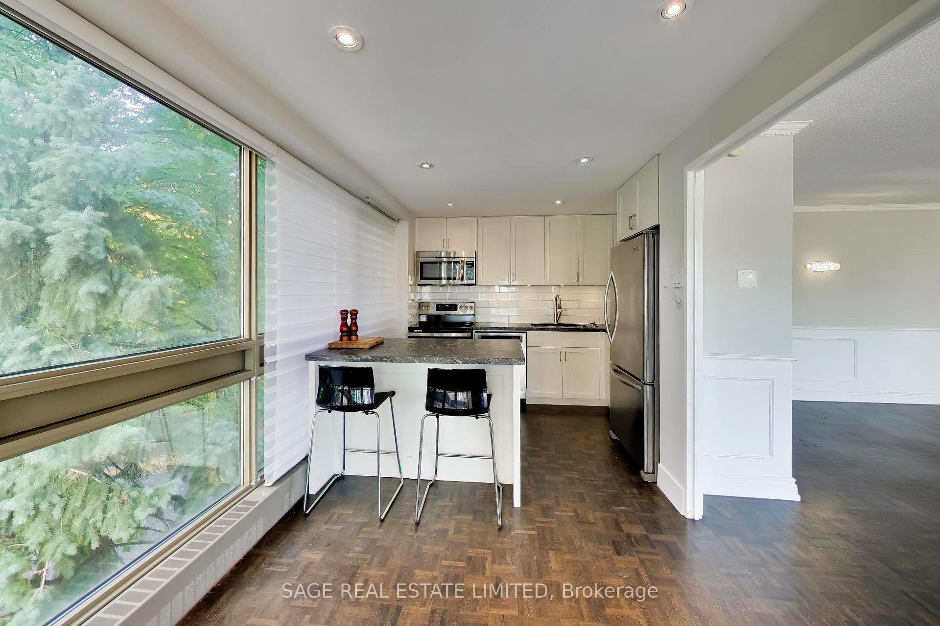 Photo 6 of Unit 403, 63 St Clair Avenue W, Toronto, Yonge-St. Clair — HOMEH