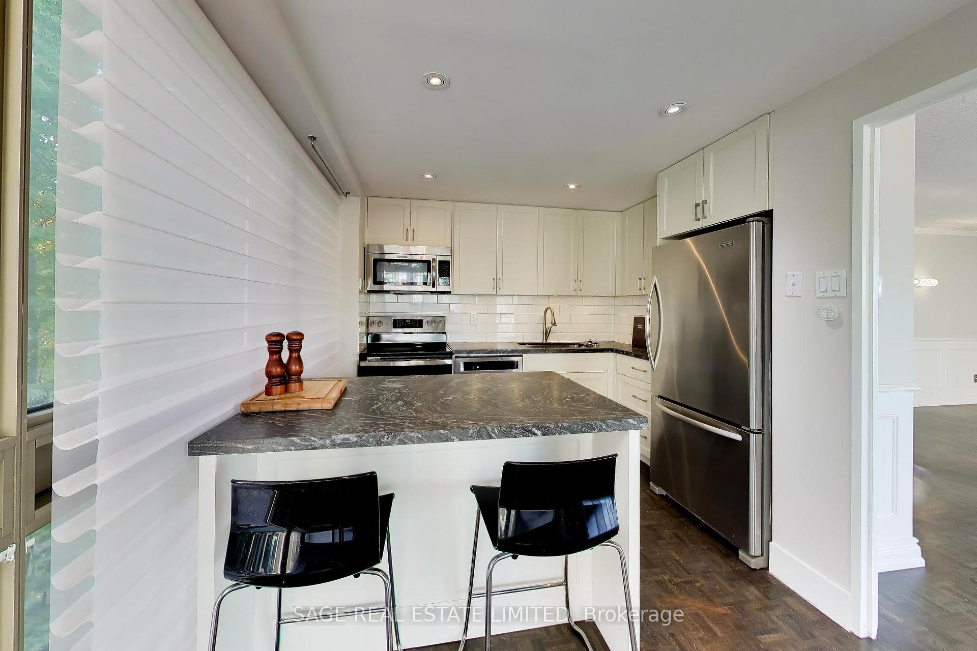 Photo 7 of Unit 403, 63 St Clair Avenue W, Toronto, Yonge-St. Clair — HOMEH