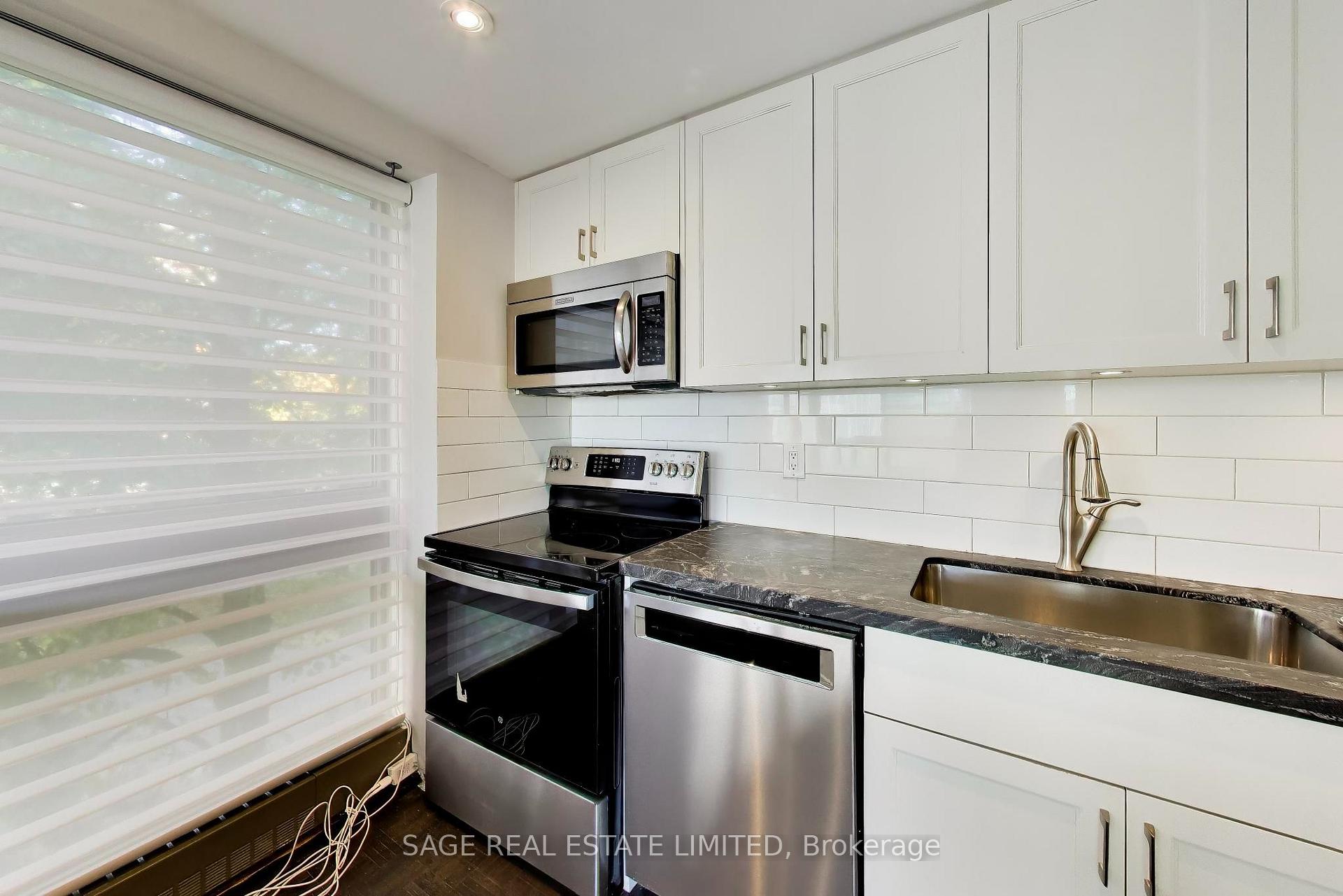 Photo 8 of Unit 403, 63 St Clair Avenue W, Toronto, Yonge-St. Clair — HOMEH