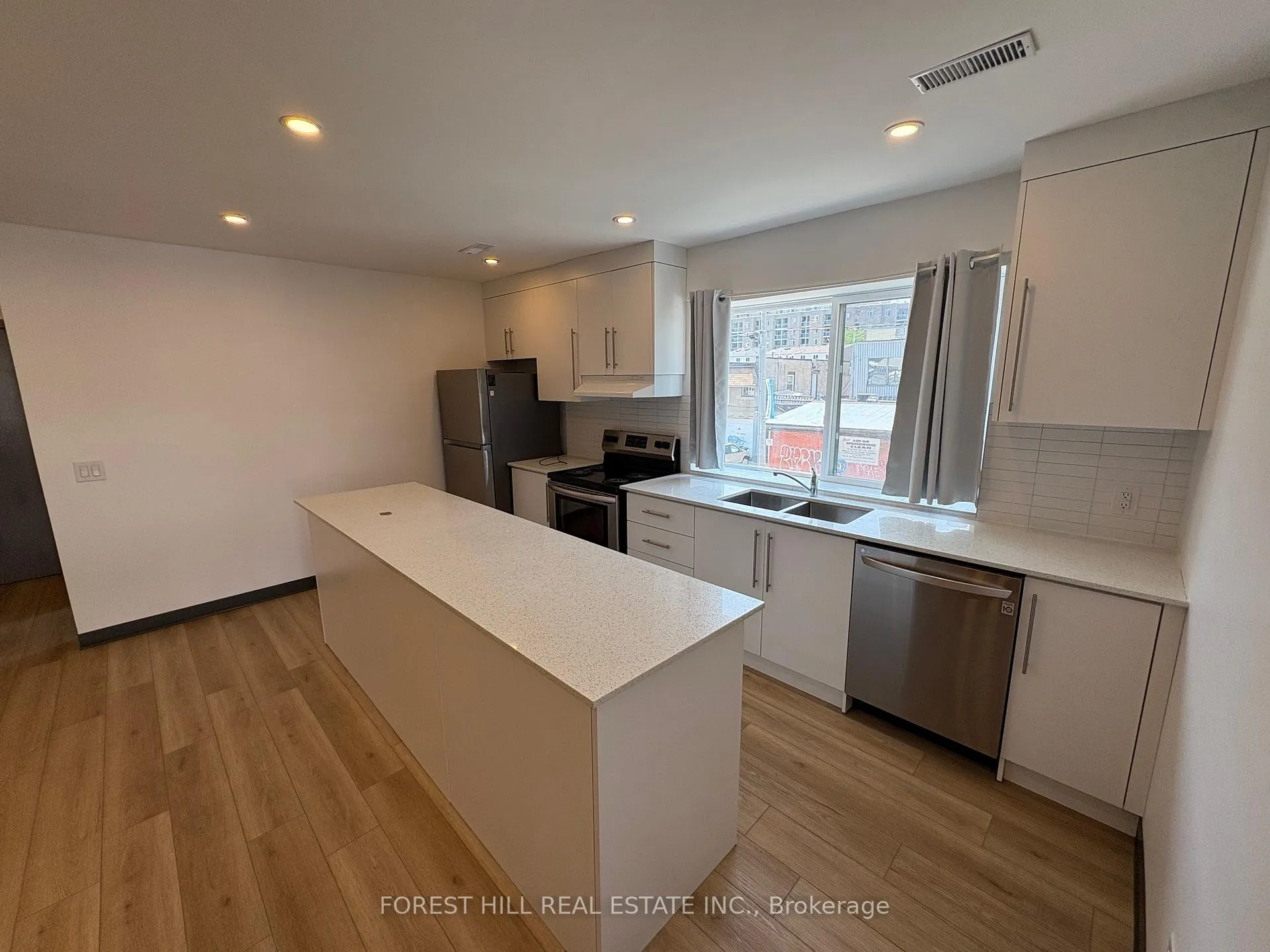 Photo 2 of Unit 2, 2879 Danforth Avenue, Toronto, East End-Danforth — HOMEH
