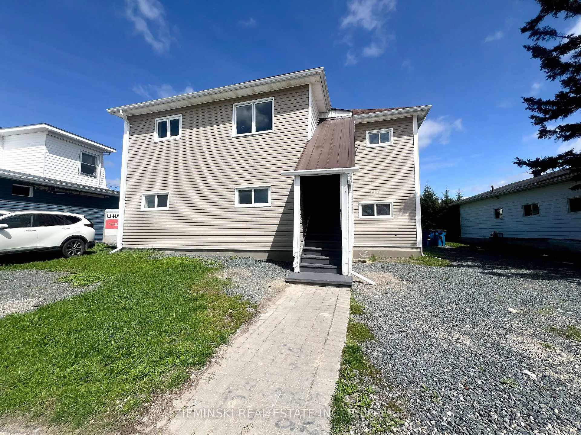 Photo 1 of Unit B, 310 Ninth Avenue, Cochrane — HOMEH