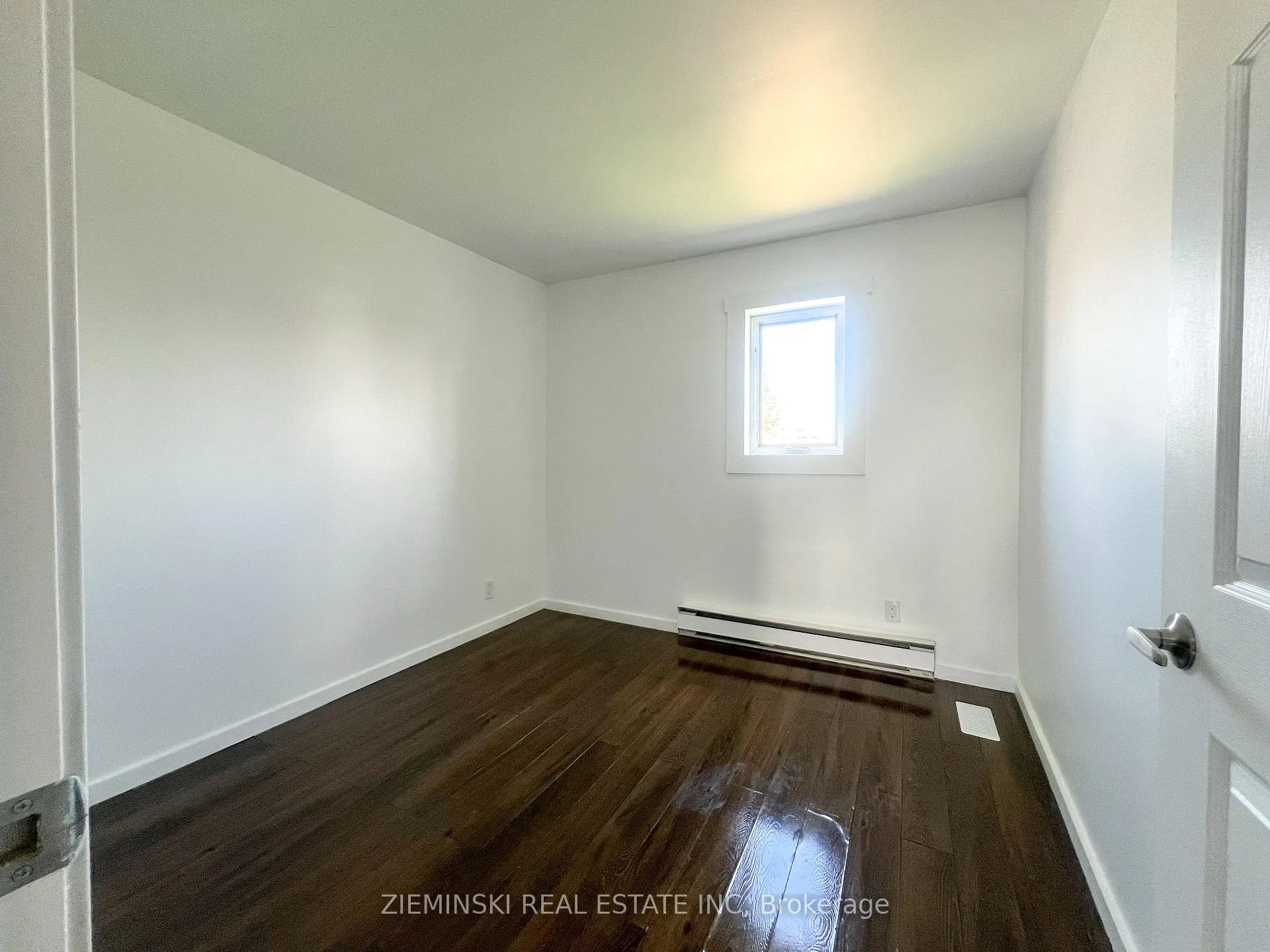 Photo 13 of Unit B, 310 Ninth Avenue, Cochrane — HOMEH