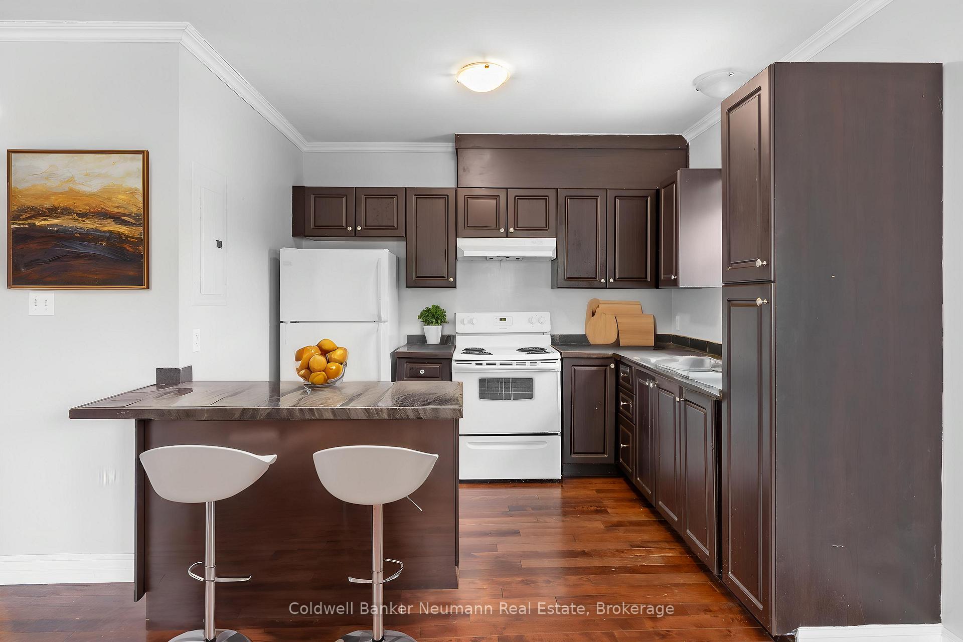 Photo 8 of Unit D, 246 Woolwich Street, Guelph, Downtown — HOMEH