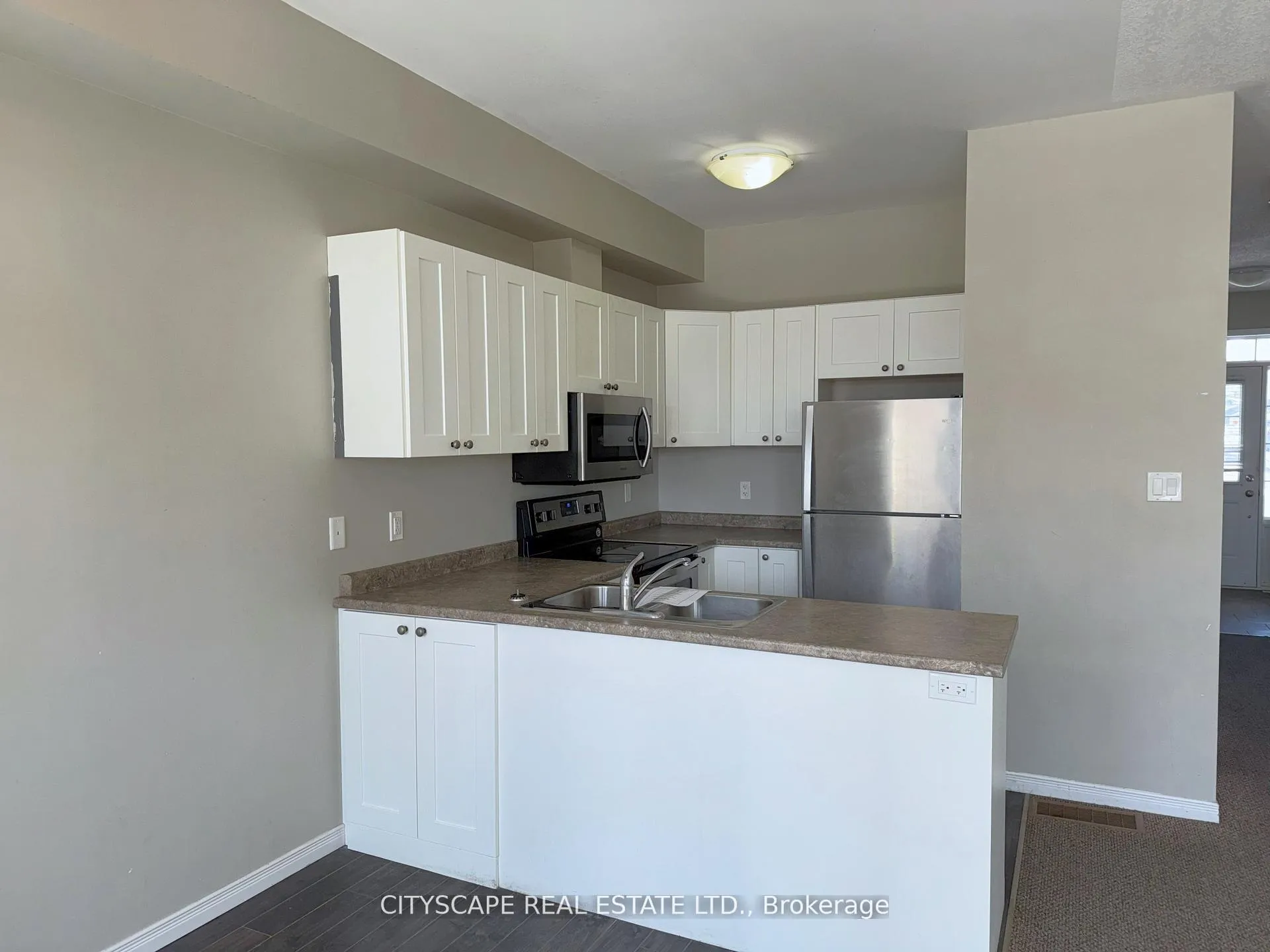 Photo 10 of Unit 9, 21 Diana Avenue, Brantford — HOMEH