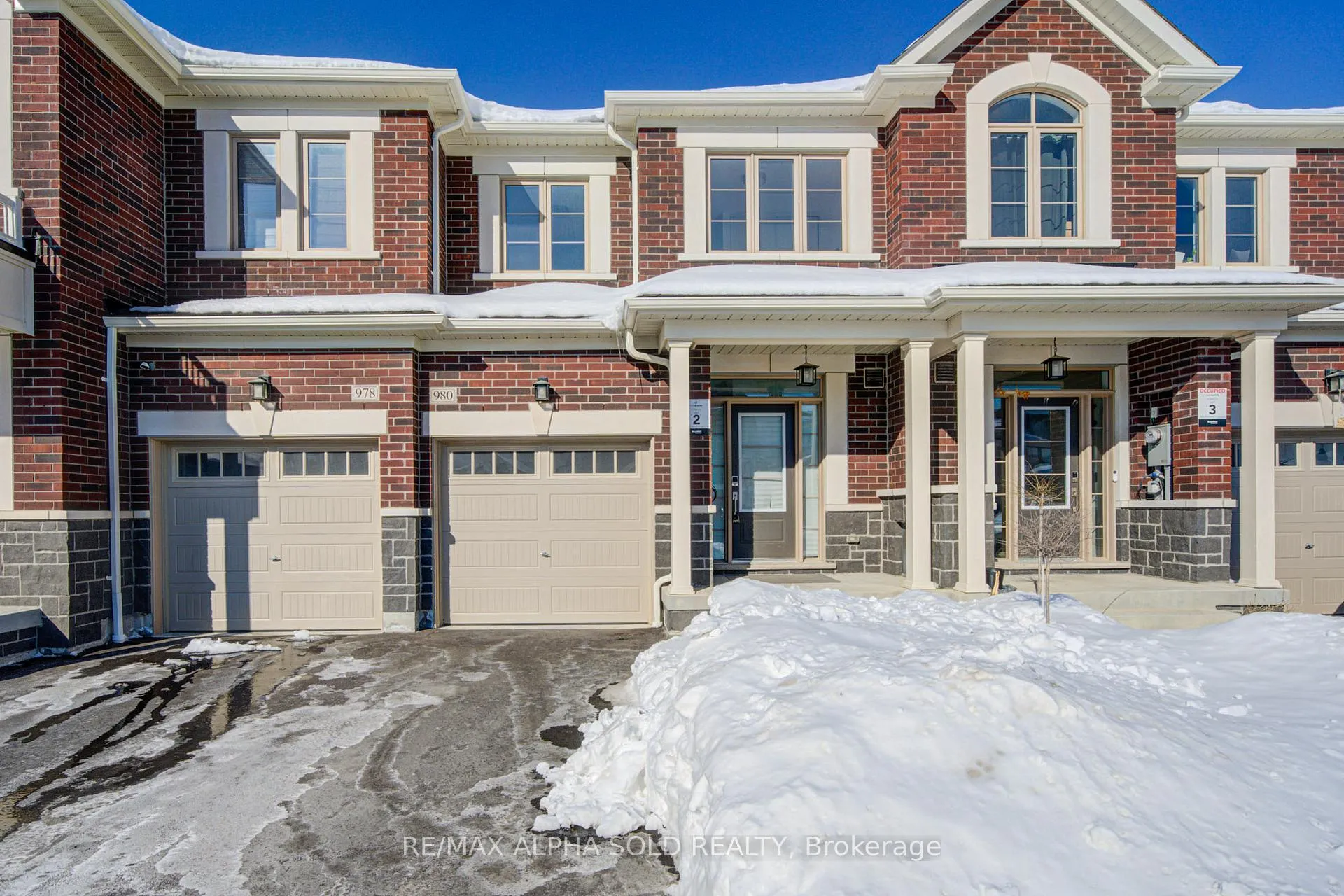 Front of 980 Crowsnest Hollow Avenue S