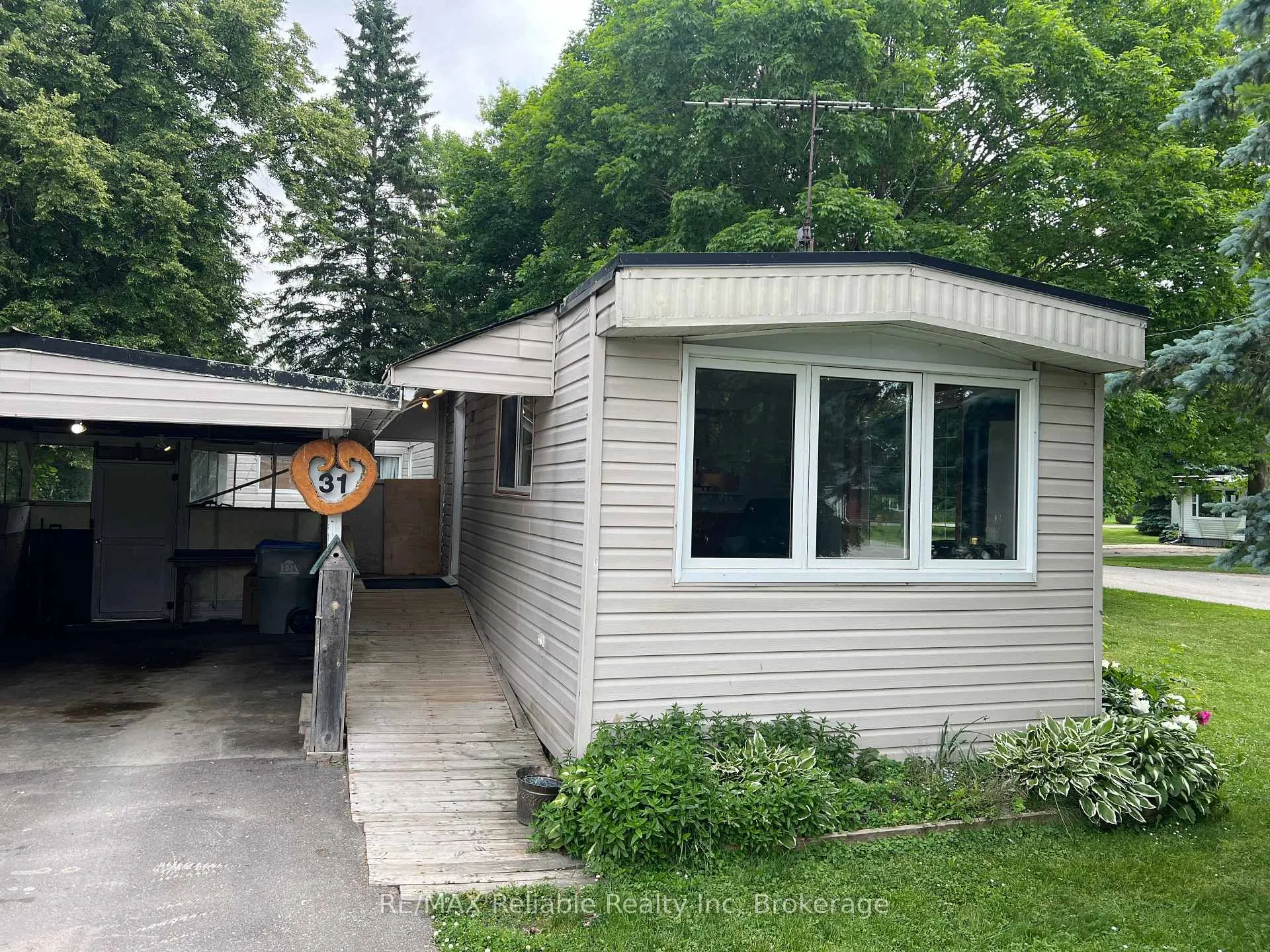Photo 2 of 31 Trailer Park Road, Huron East, Brussels — HOMEH