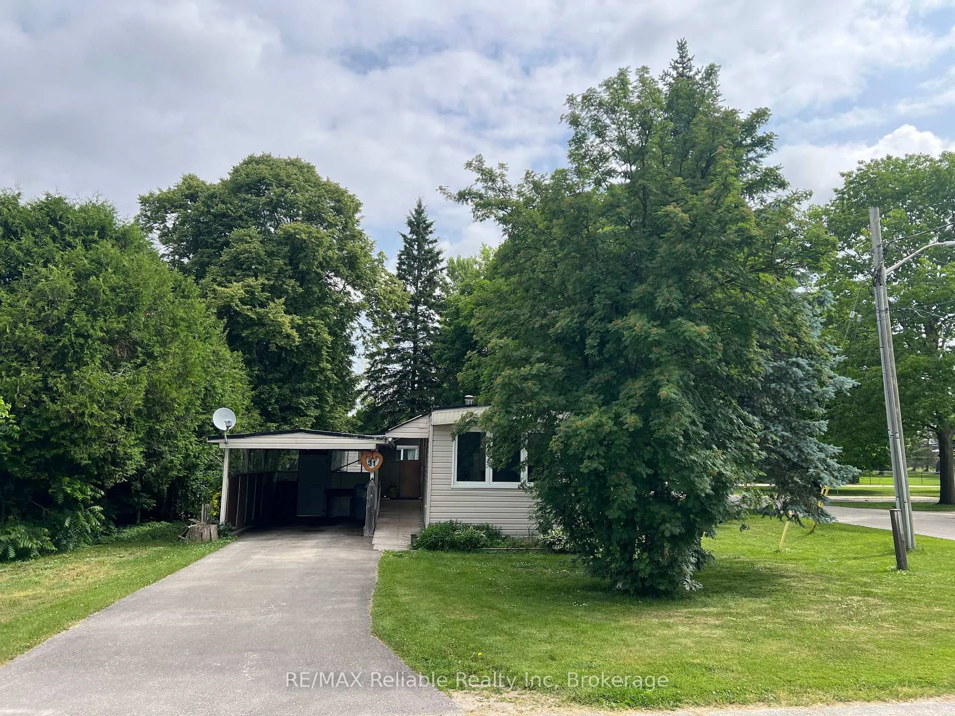 Photo 4 of 31 Trailer Park Road, Huron East, Brussels — HOMEH