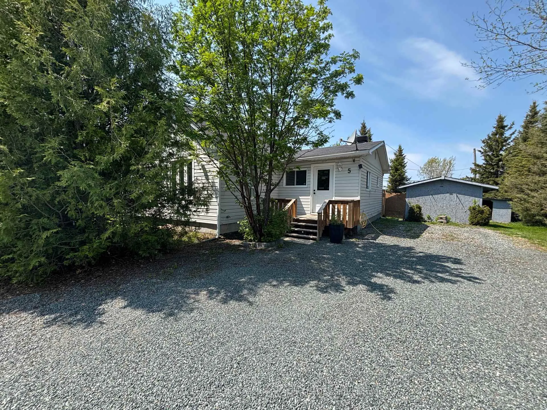 Photo 1 of 5 Algonquin Road, Cochrane — HOMEH