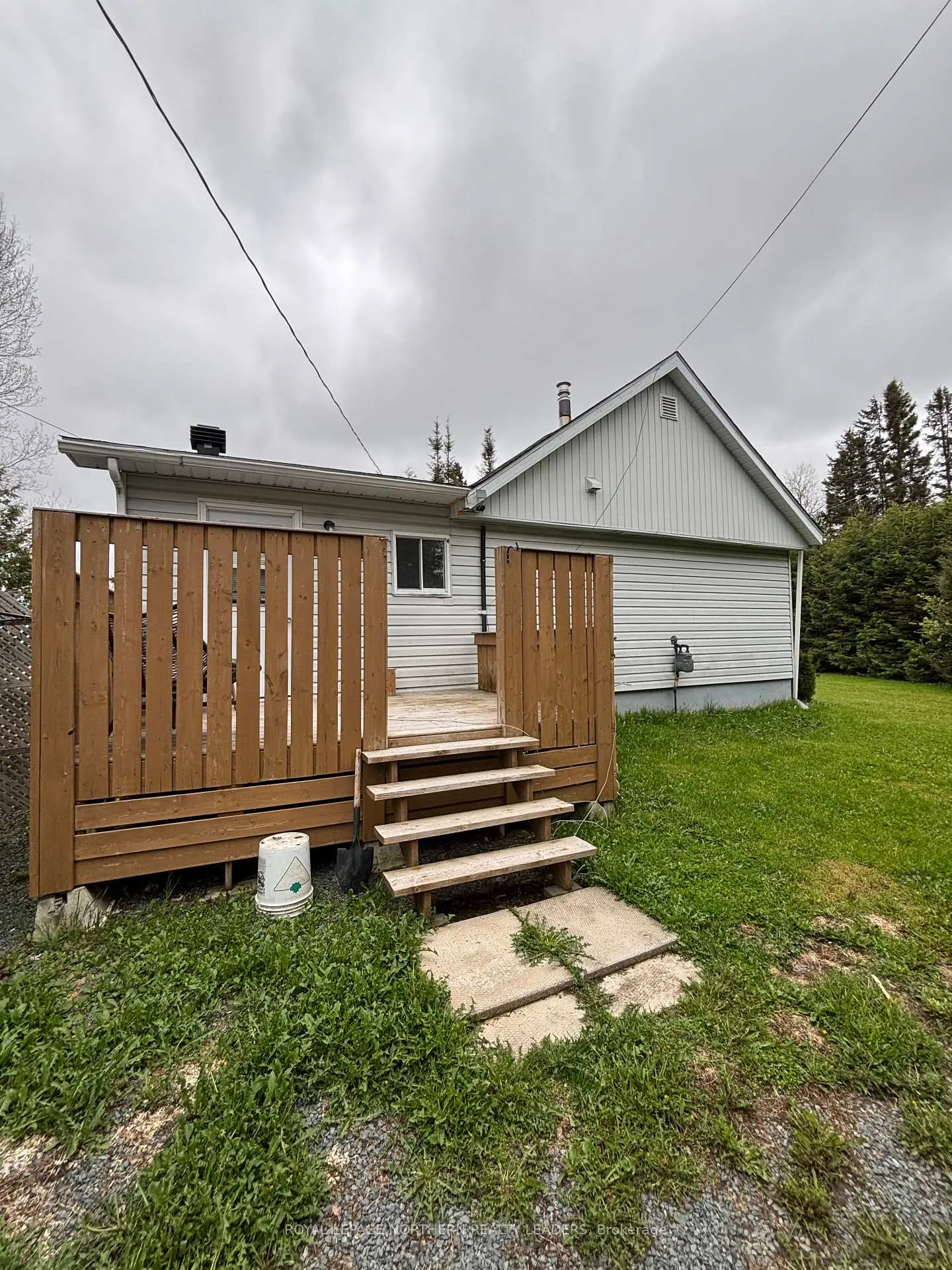 Photo 3 of 5 Algonquin Road, Cochrane — HOMEH
