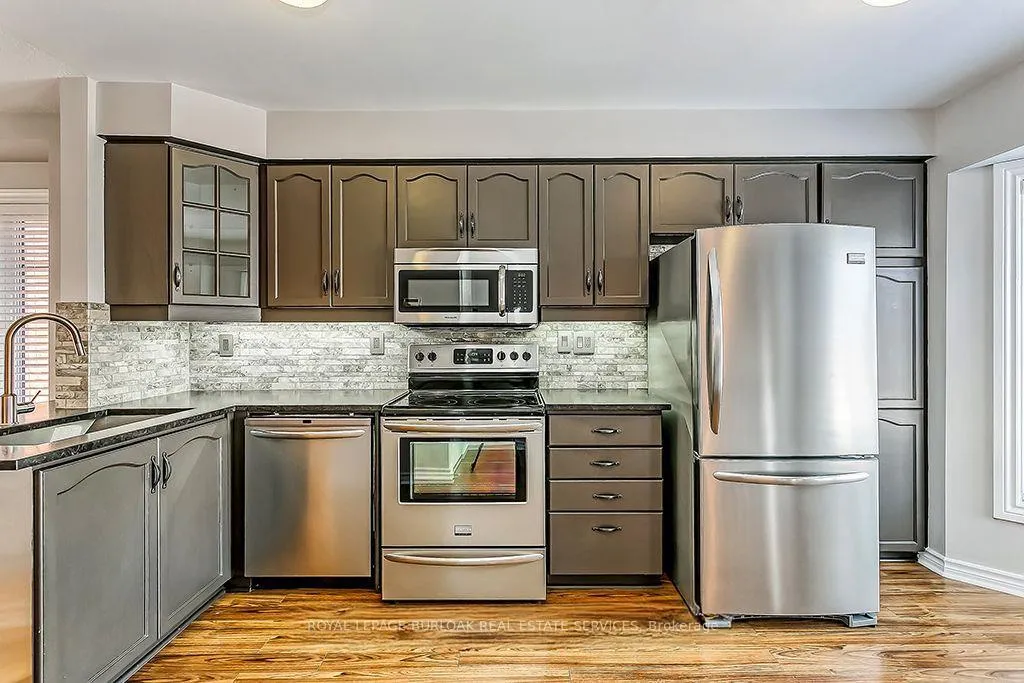 Photo 3 of Unit 13, 3480 Upper Middle Road, Burlington, Palmer — HOMEH