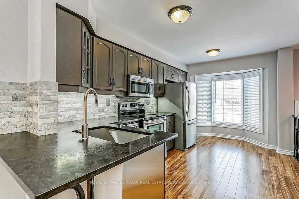 Photo 4 of Unit 13, 3480 Upper Middle Road, Burlington, Palmer — HOMEH