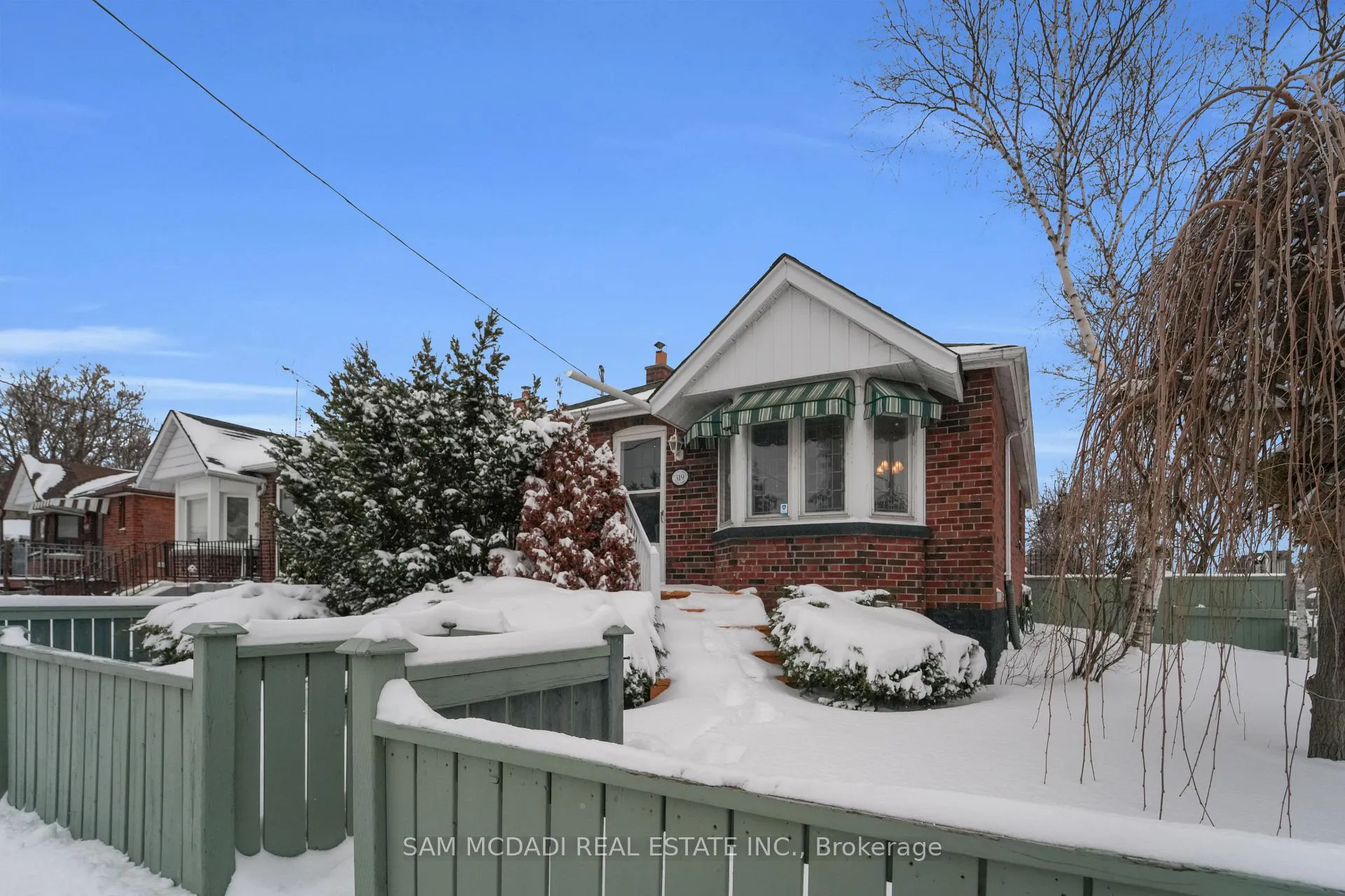 Front of 319 Cosburn Avenue