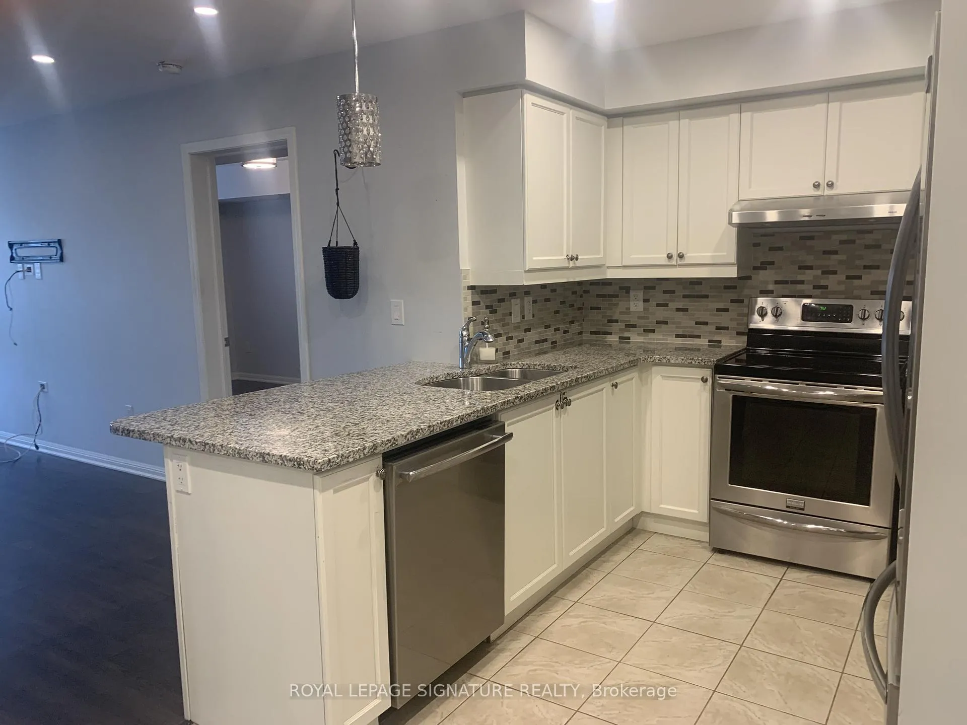 Photo 3 of Unit 207, 1045 Nadalin Heights, Milton, Willmott — HOMEH