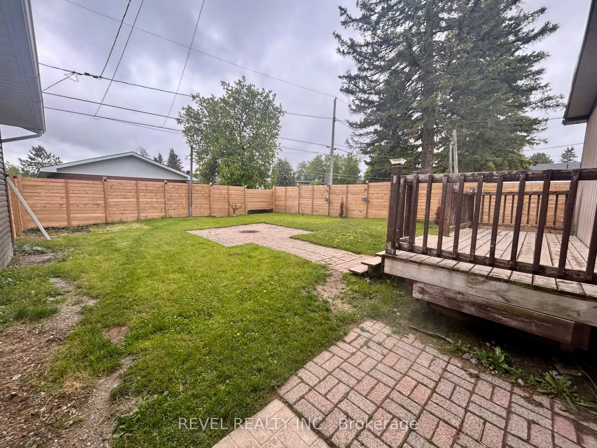 Photo 4 of 52 Huron Road, Cochrane — HOMEH