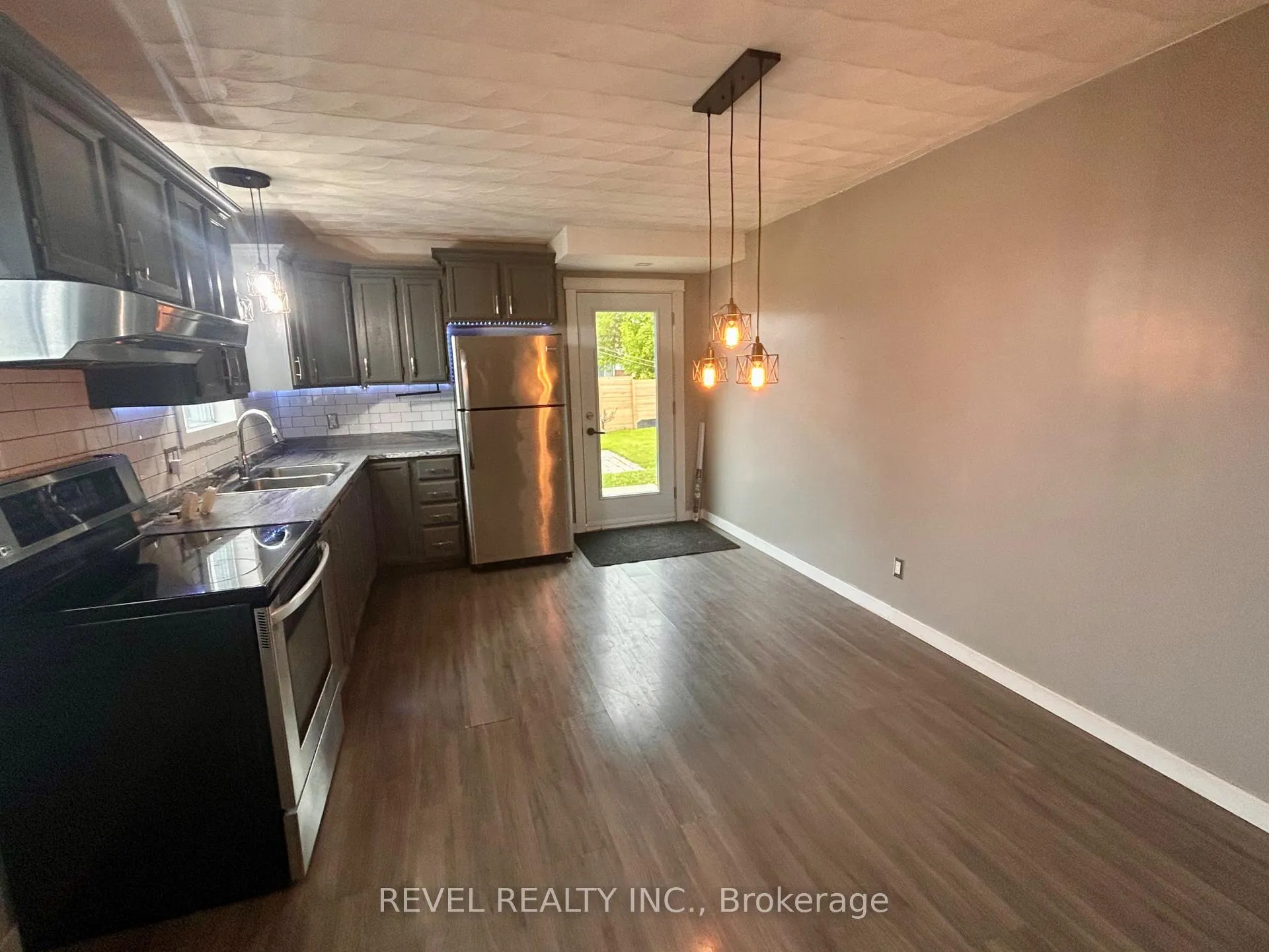 Photo 6 of 52 Huron Road, Cochrane — HOMEH