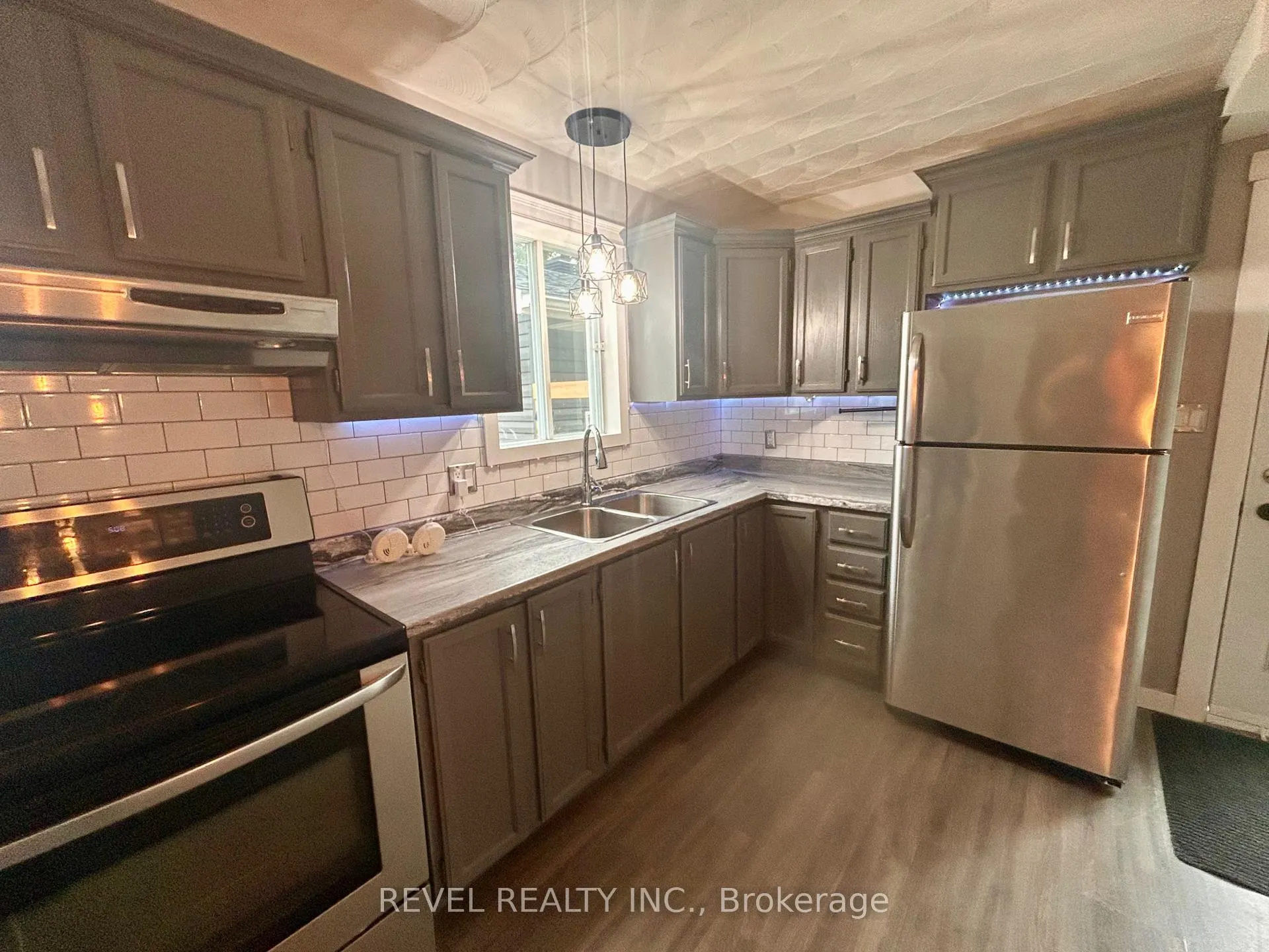 Photo 8 of 52 Huron Road, Cochrane — HOMEH