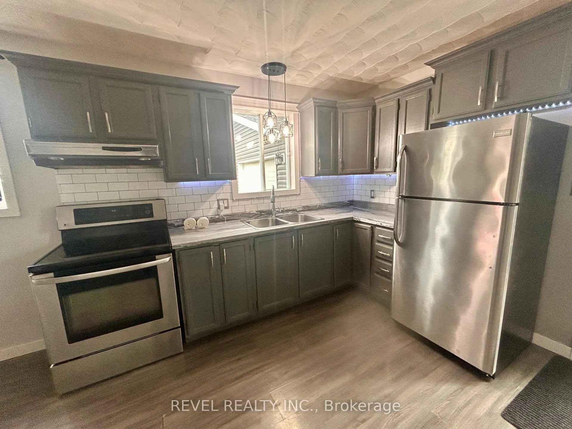 Photo 27 of 52 Huron Road, Cochrane — HOMEH