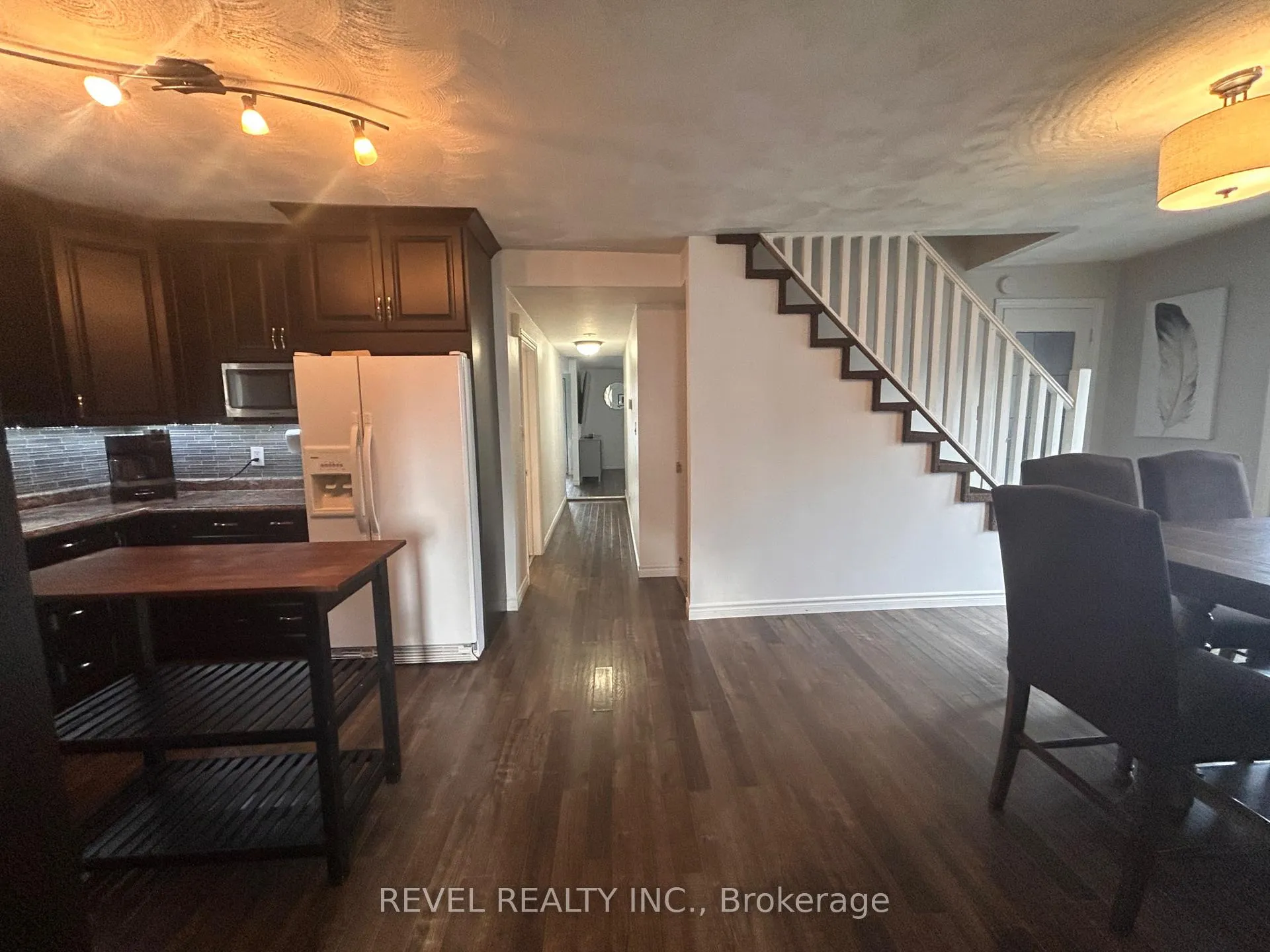Photo 6 of 165 Seventeenth Avenue, Cochrane — HOMEH