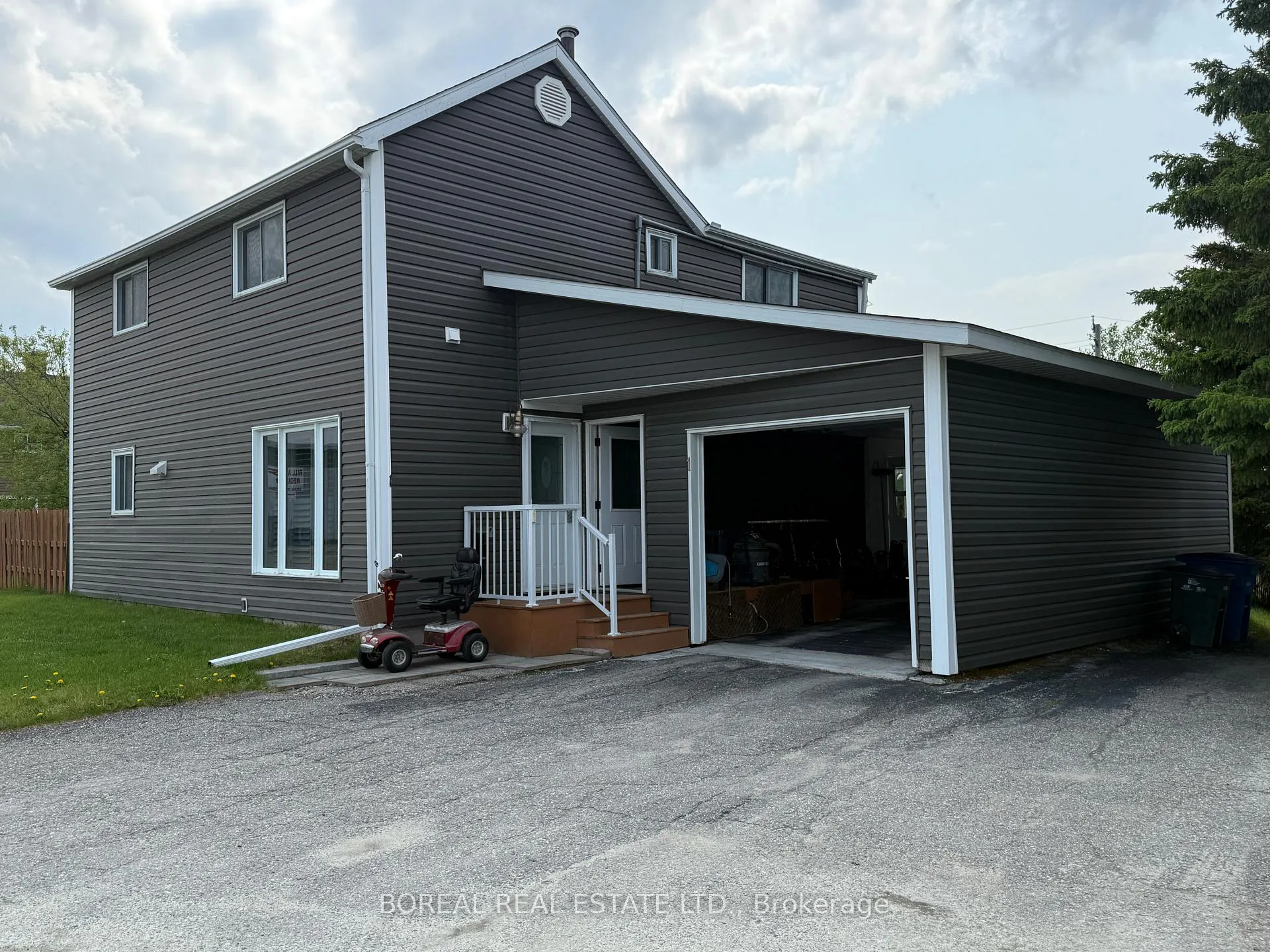 Photo 2 of 1 Boisvert Crescent, Cochrane — HOMEH
