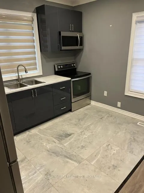 Photo 6 of Unit 1, 299 Hellems Avenue, Welland, Welland Downtown — HOMEH