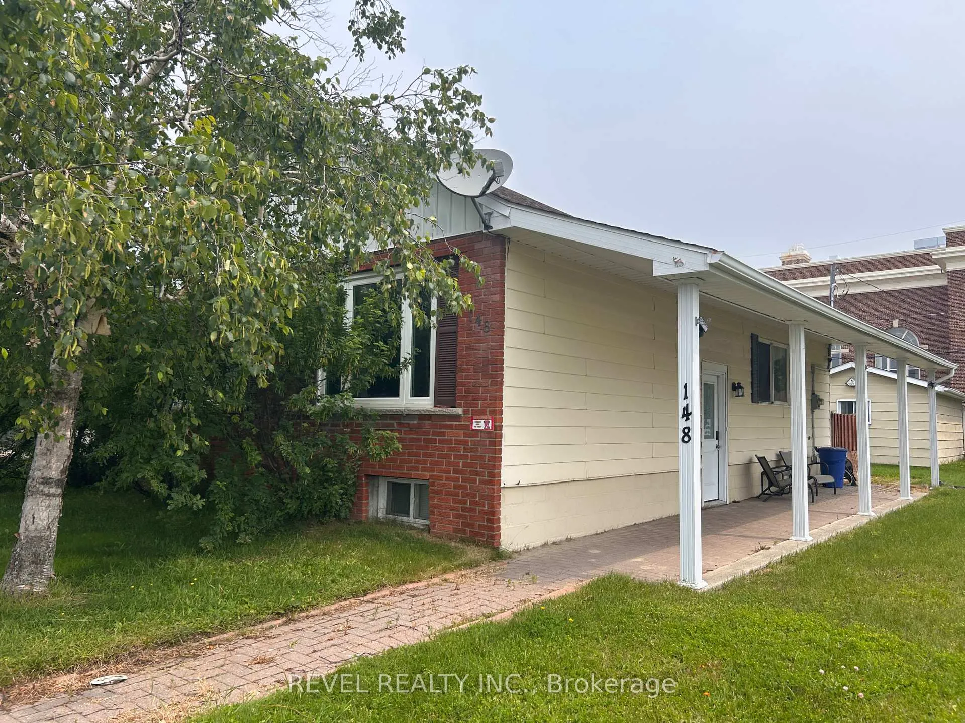 Photo 1 of 148 Third Avenue, Cochrane — HOMEH