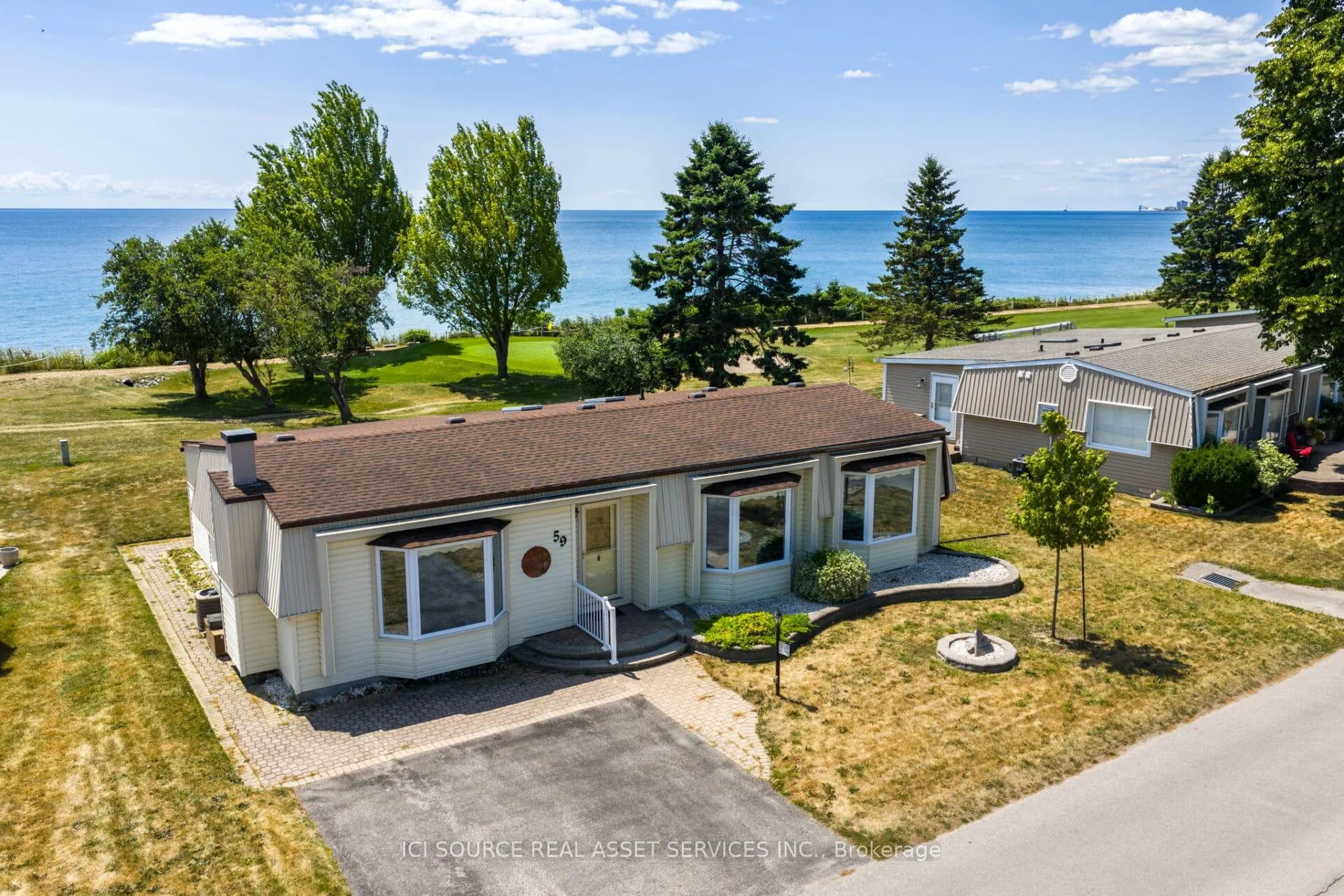 Photo 1 of 59 The Cove Road, Clarington, Bowmanville — HOMEH