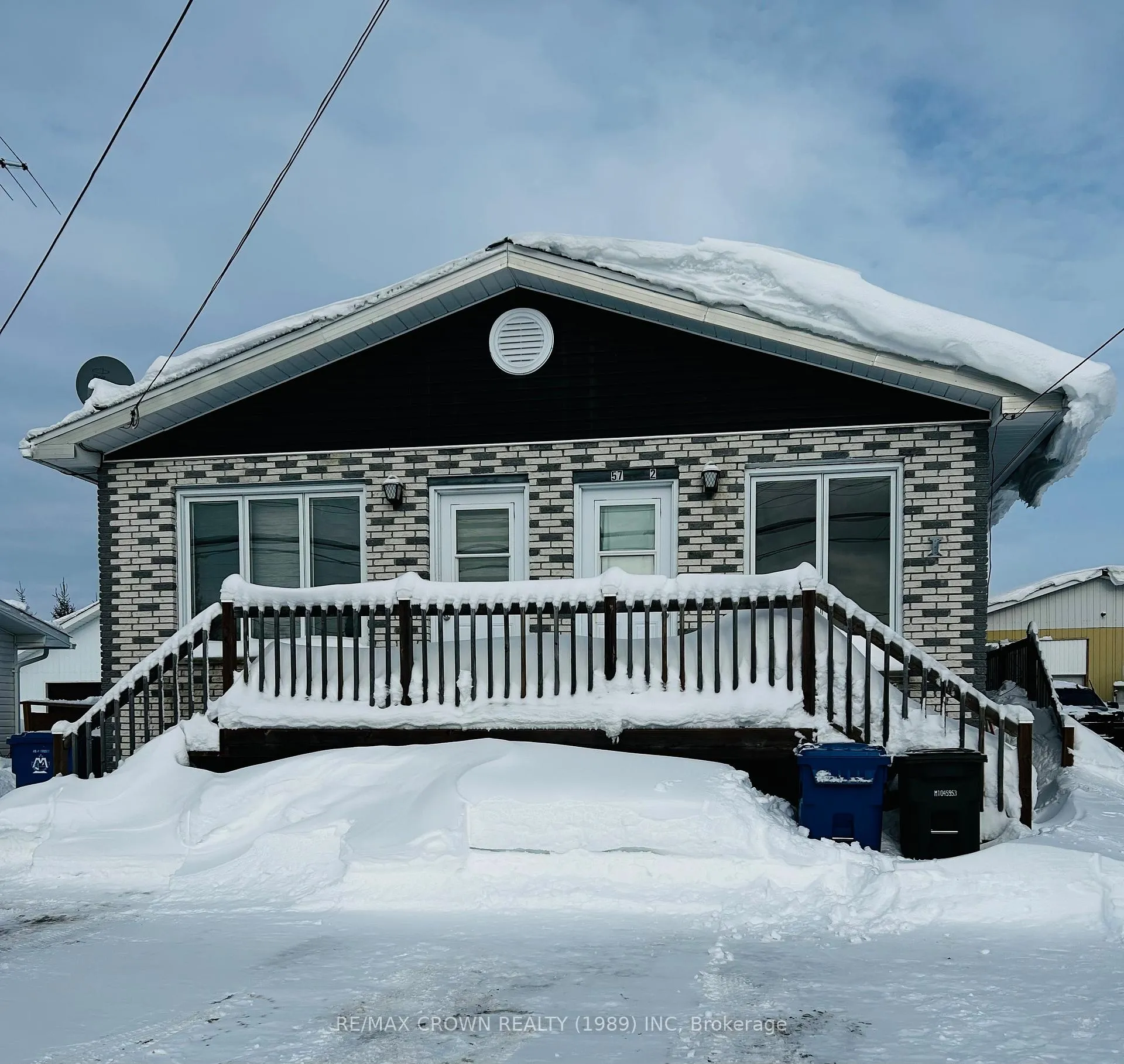 Front of 57 Leonard Moonbeam Avenue N
